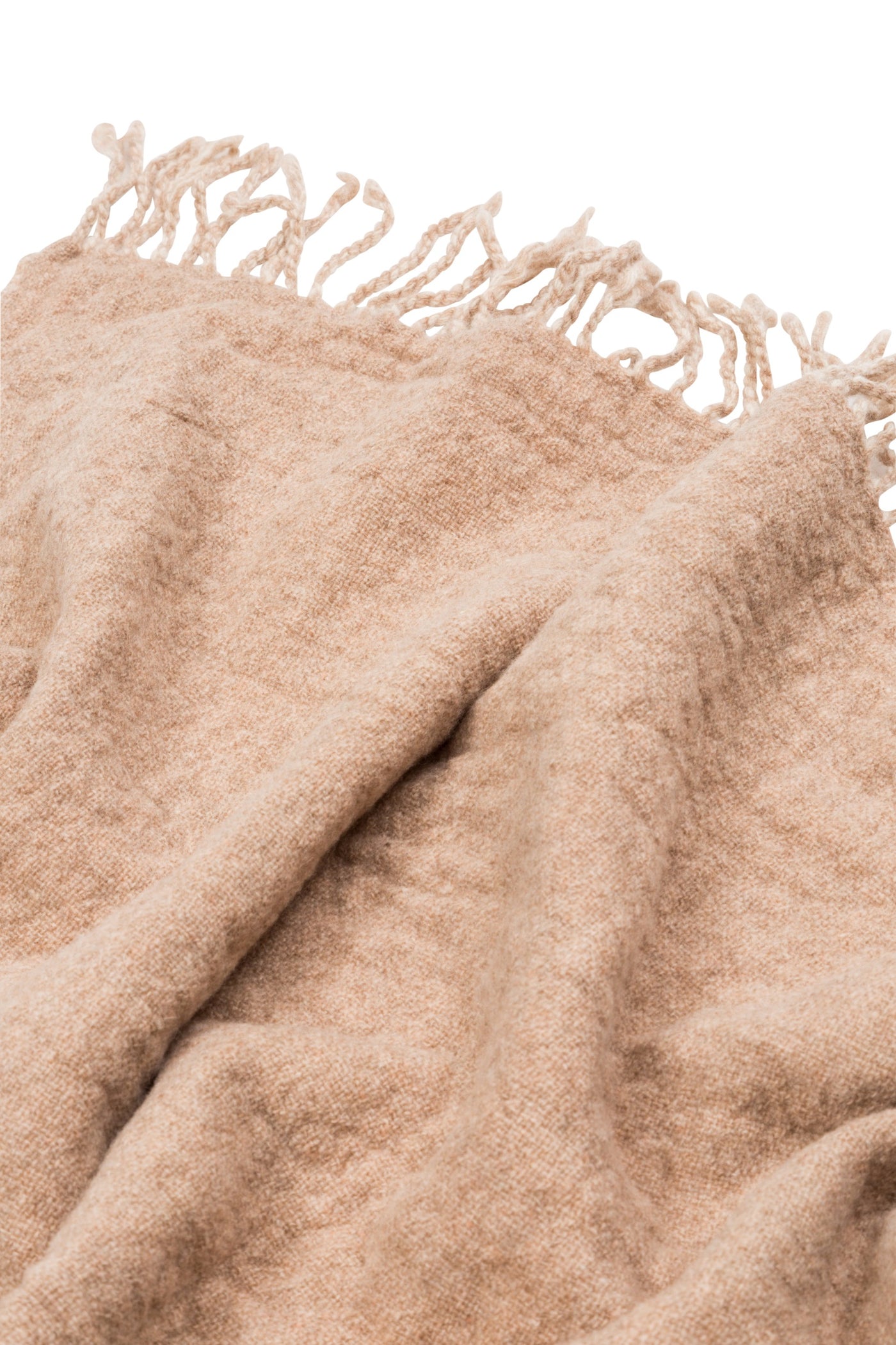 Close-up of Lanerossi Dioniso throw in warm sand, showing soft woven texture and knotted fringe trim.