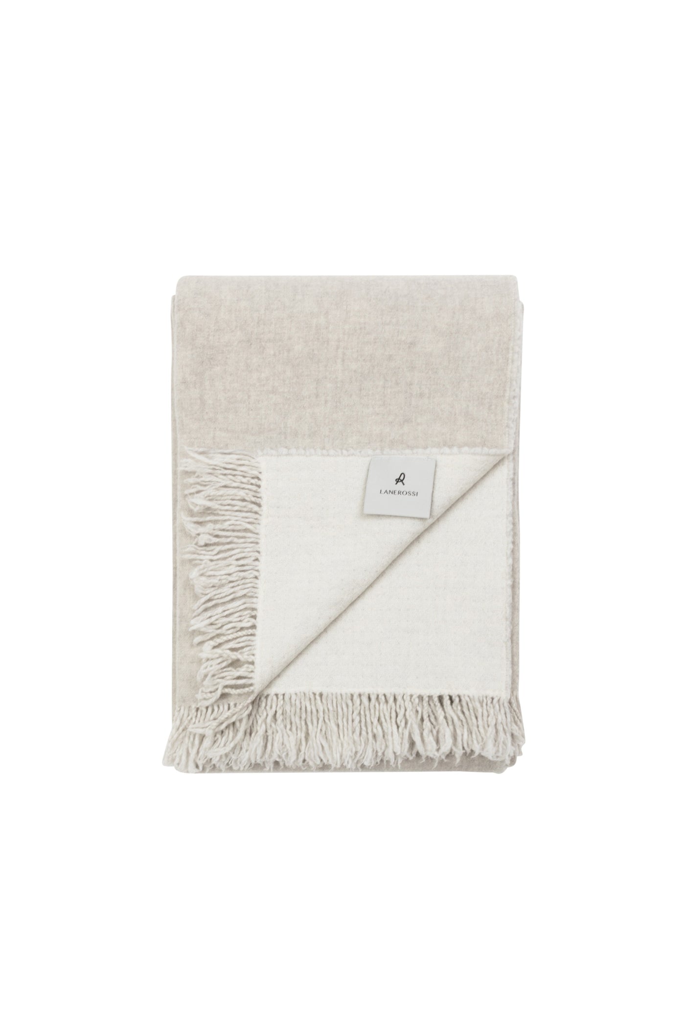 Lanerossi Dioniso throw folded flat, ivory and oat reversible weave with fringe trim.