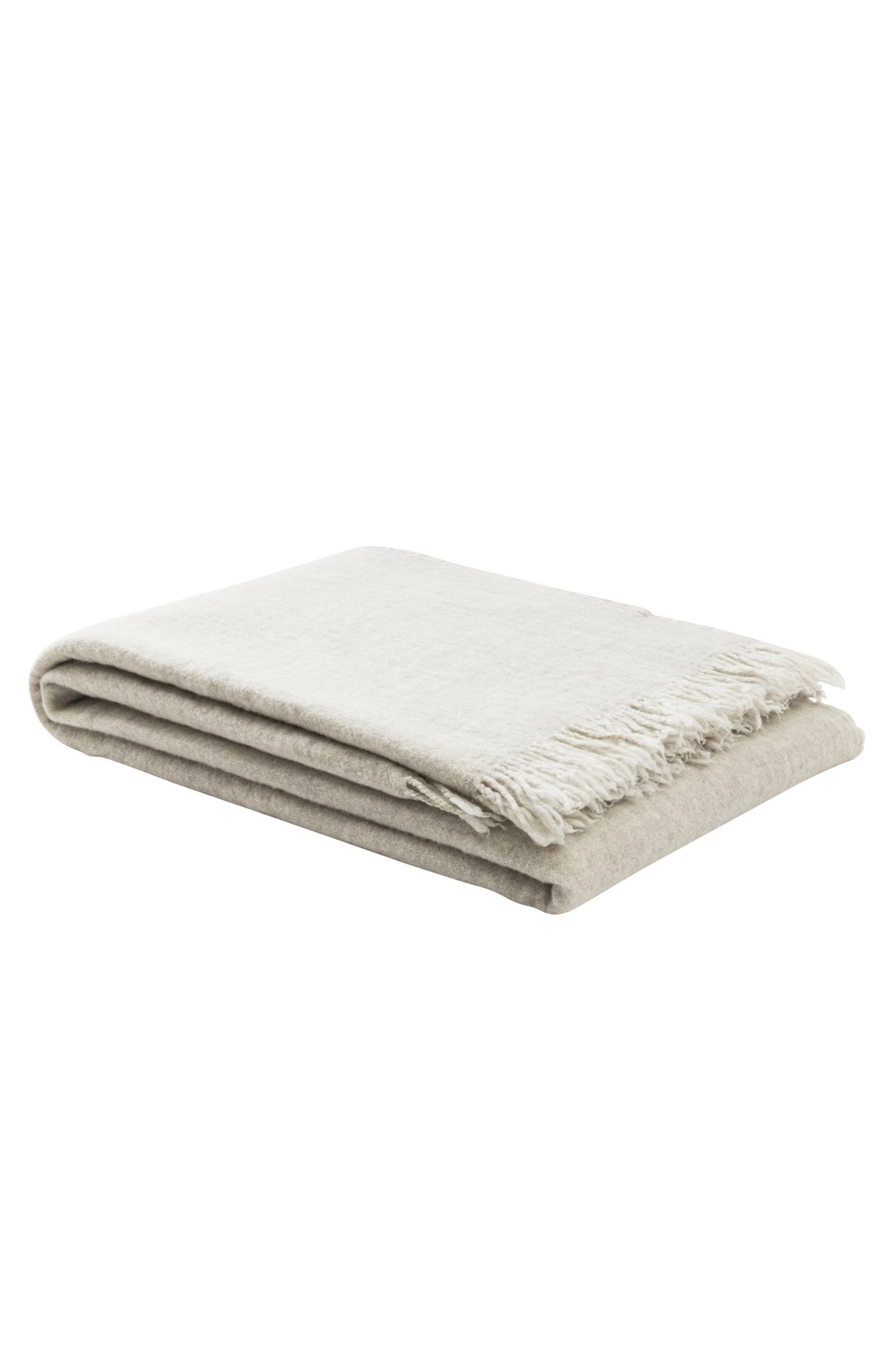 Folded ivory wool throw with fringe trim, shown against white background.