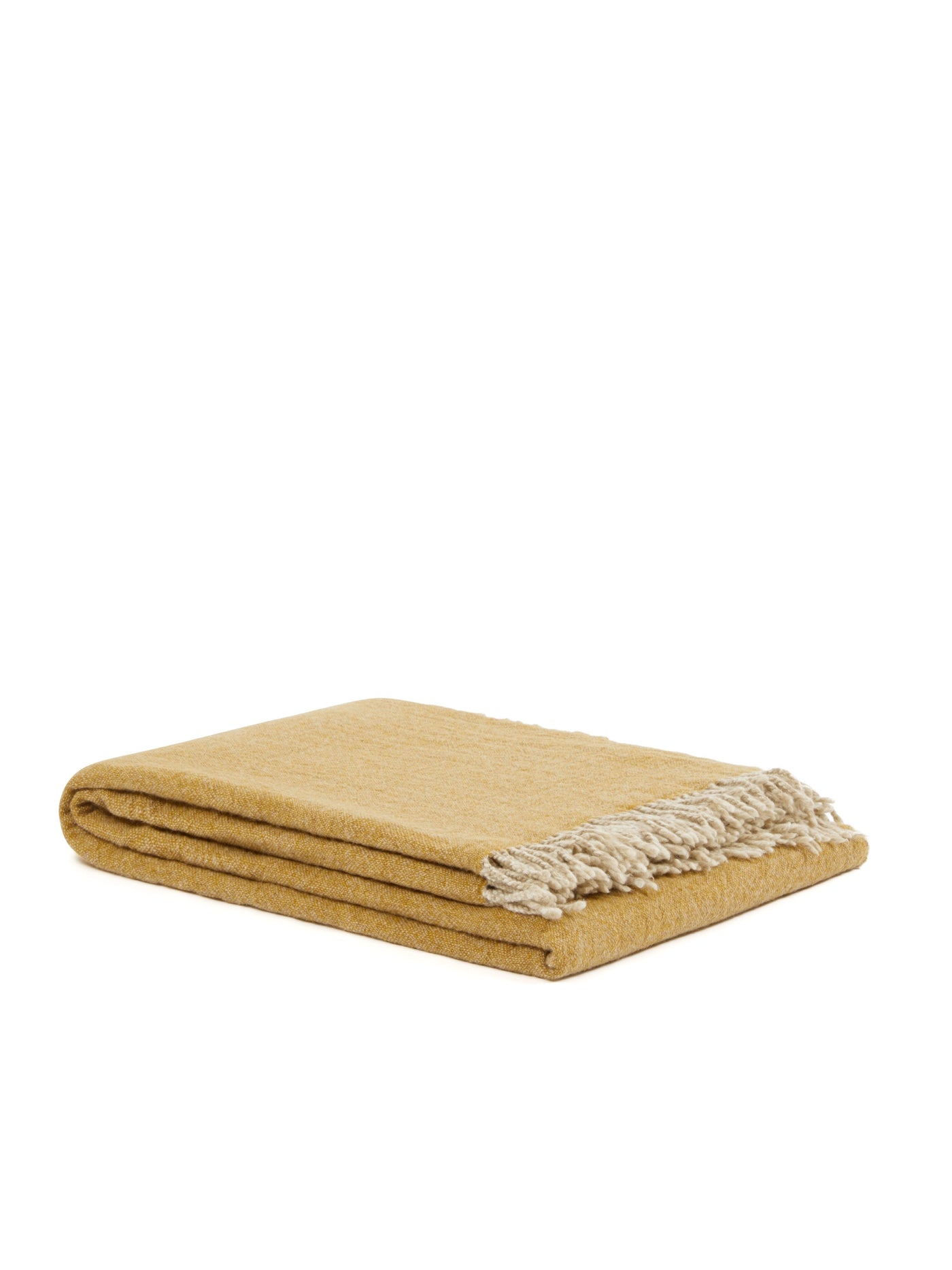 Folded saffron wool throw with ivory fringe trim, shown on white background.