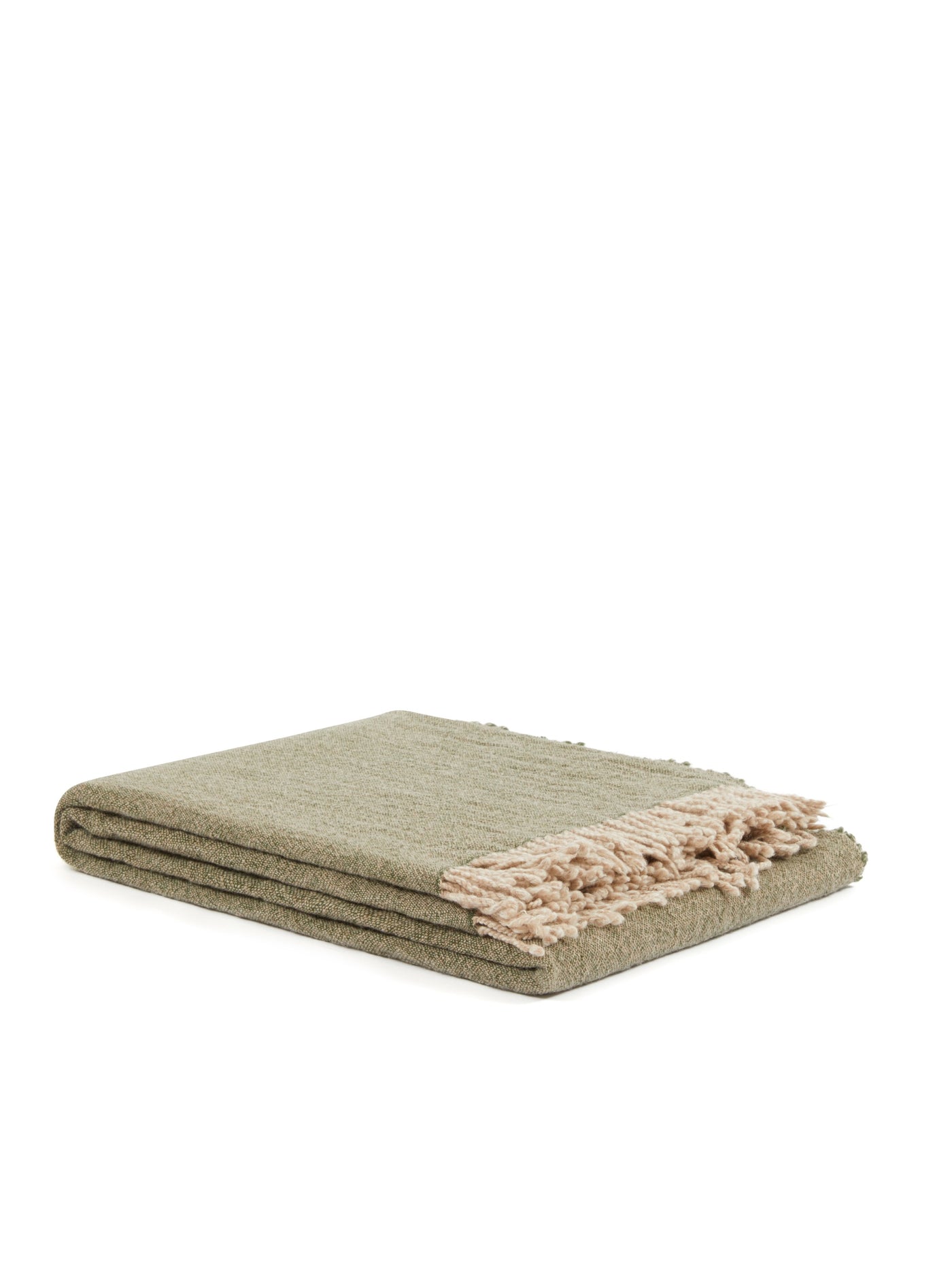 Folded sage green throw with blush fringe trim, textured boucle weave visible on edges.