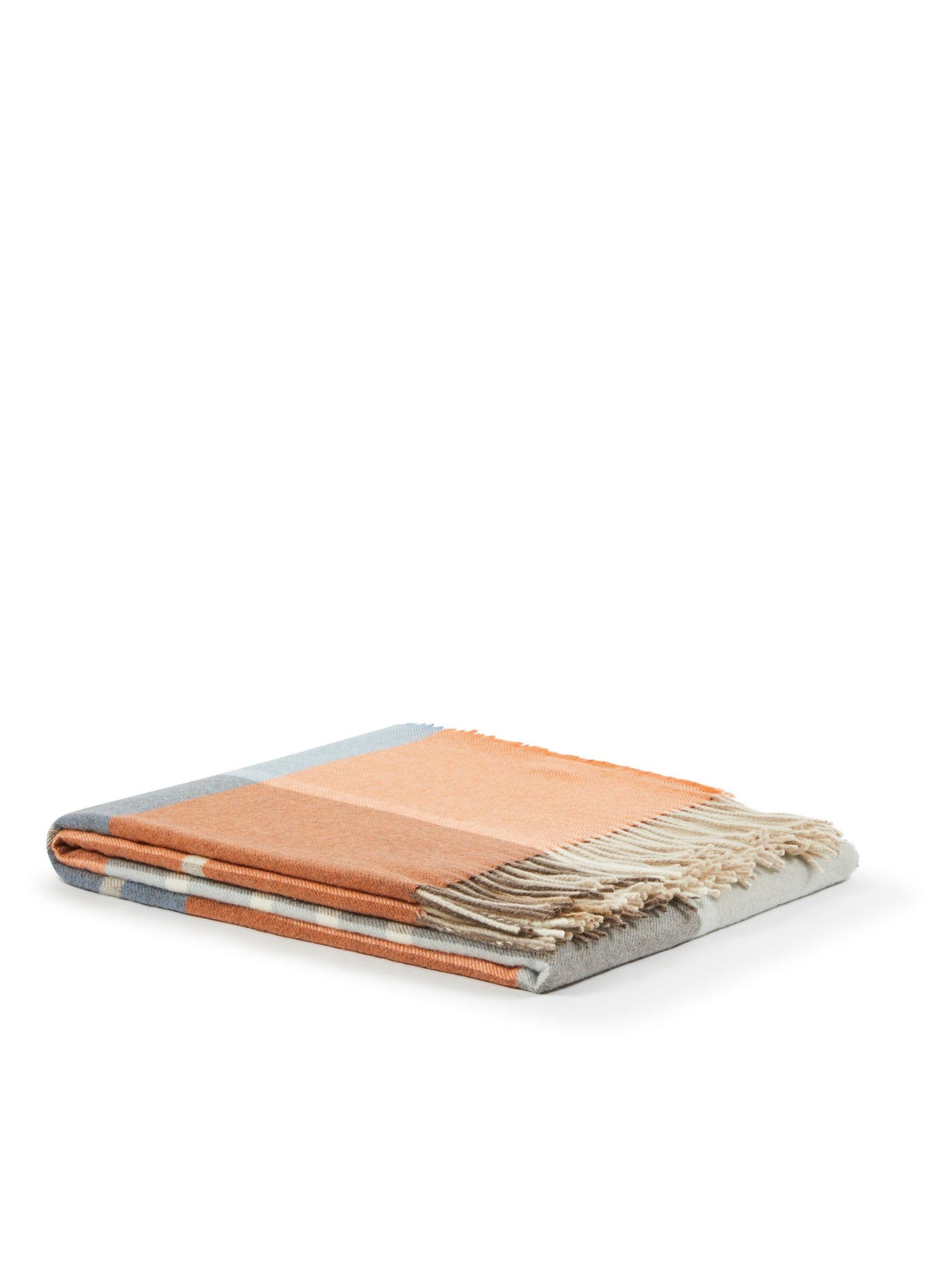 Folded Lanerossi Everest Check throw in peach and sage plaid with ivory fringe trim.