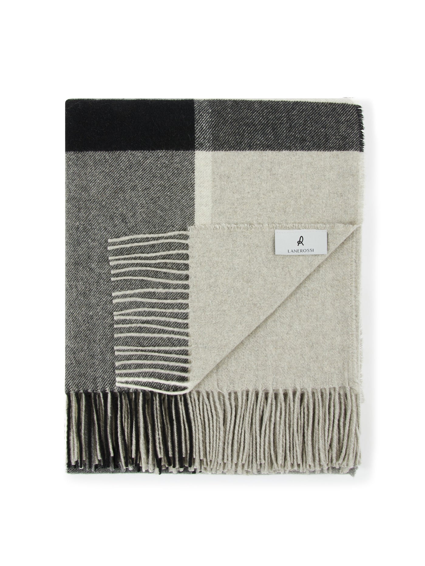 Folded Lanerossi Everest Check throw showing charcoal and ecru block pattern with fringe trim.