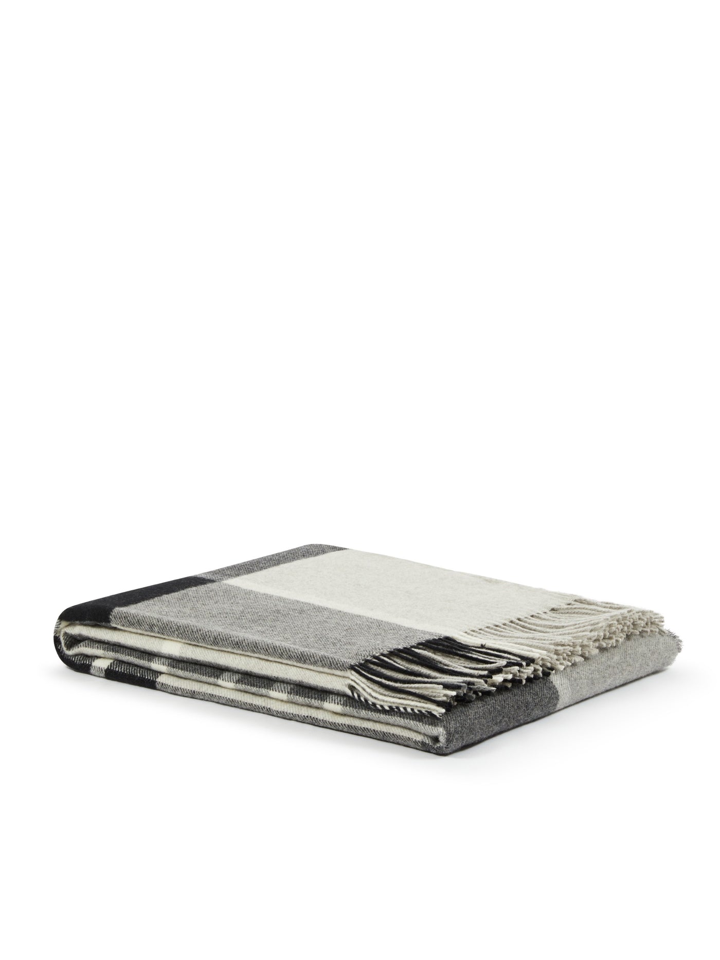 Folded Lanerossi Everest Check throw showing charcoal and ivory plaid pattern with fringe edge.