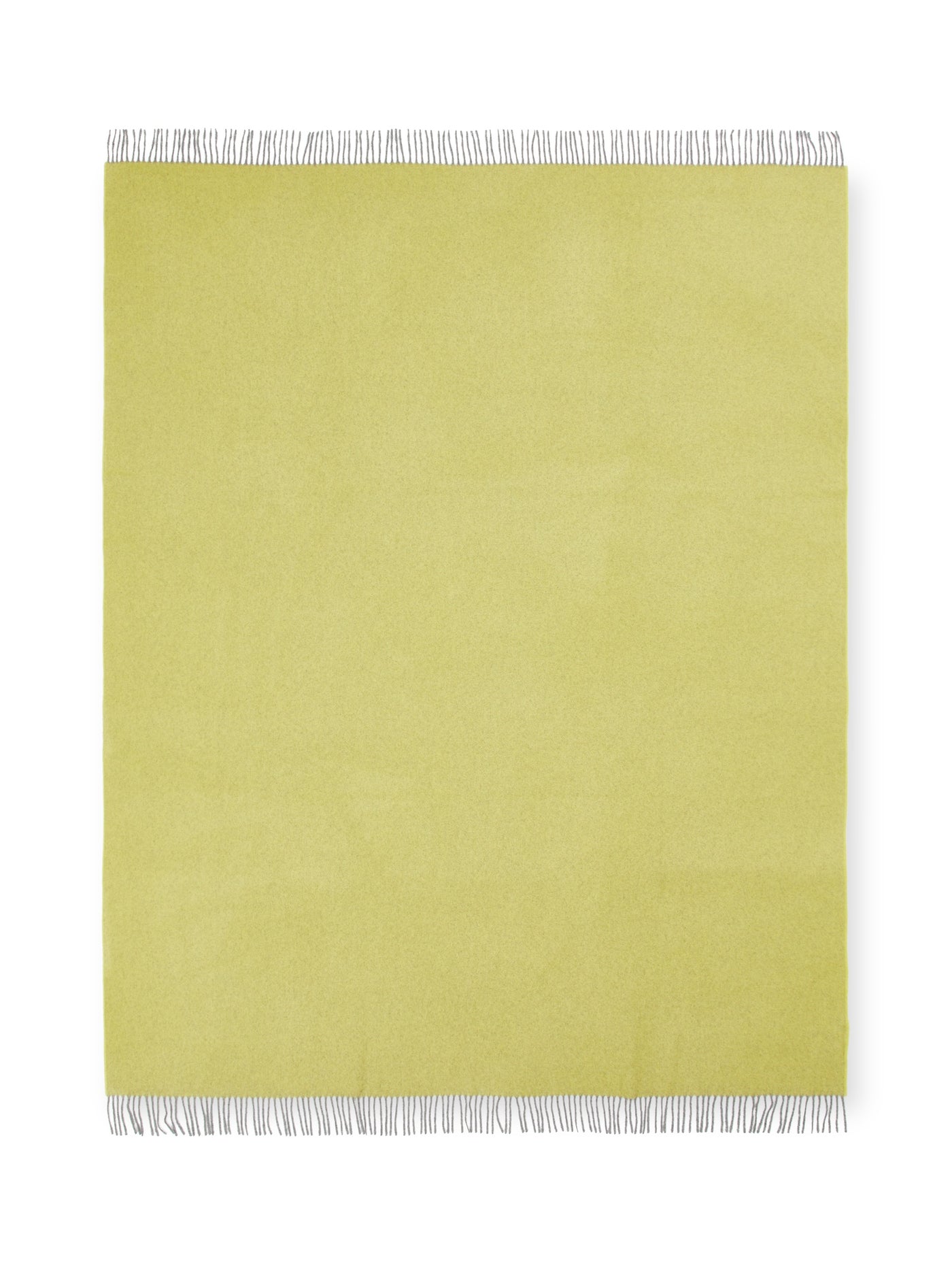 Lanerossi Everest Colour throw in chartreuse with fringe trim, flat lay view.