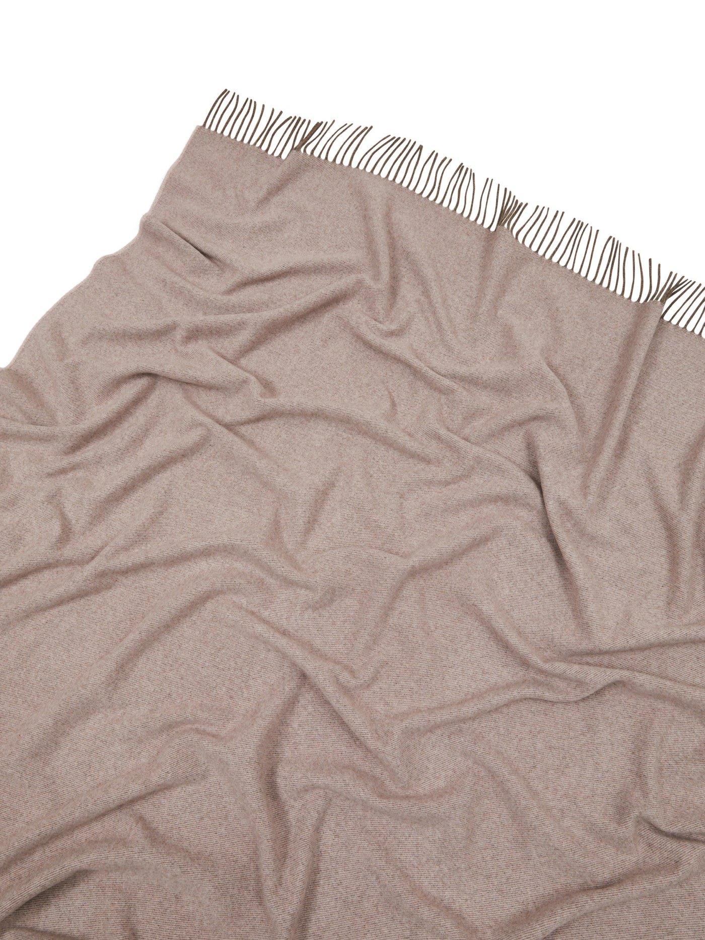 Close-up of Lanerossi Everest Colour throw in taupe with striped fringe trim.