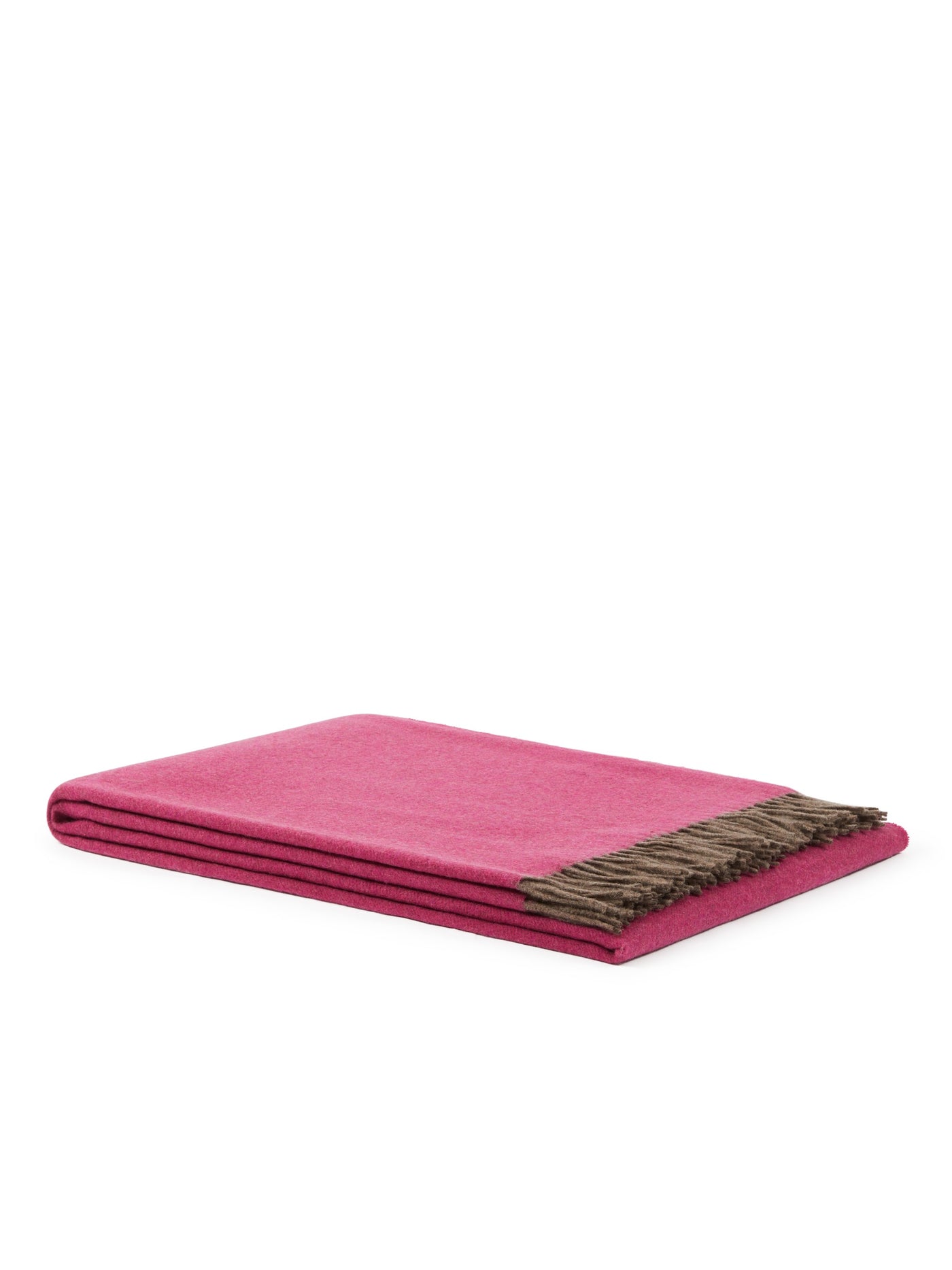 Close-up of folded fuchsia wool throw with contrasting taupe fringe trim.