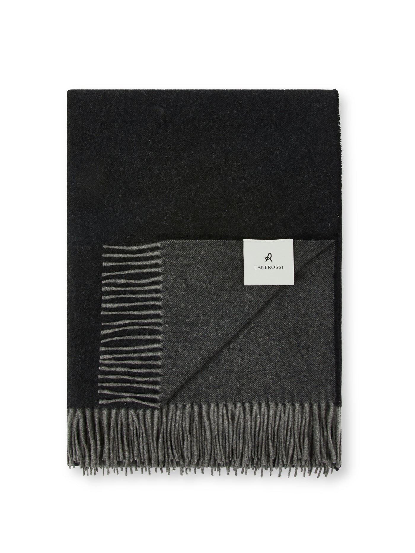 Lanerossi Everest Colour throw folded flat, ebony and charcoal reversible wool with fringe trim.
