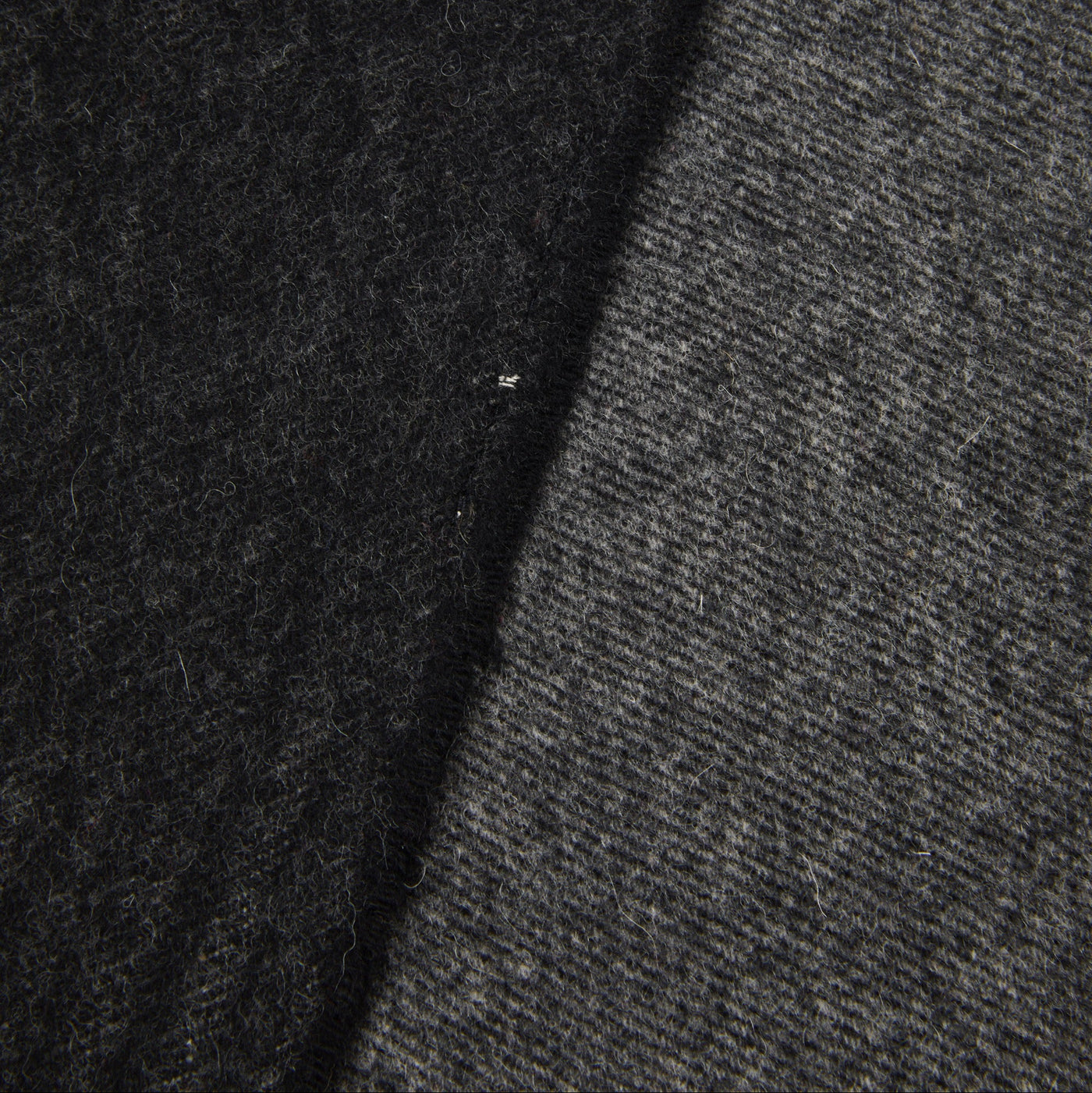 Close-up of Lanerossi Everest Colour throw showing contrast between charcoal and mid-grey wool faces.