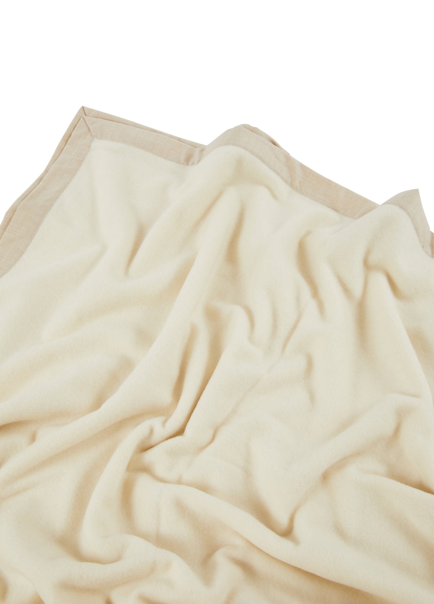 Lanerossi Geisha blanket in ivory with contrasting sand border, draped to show soft fabric texture.