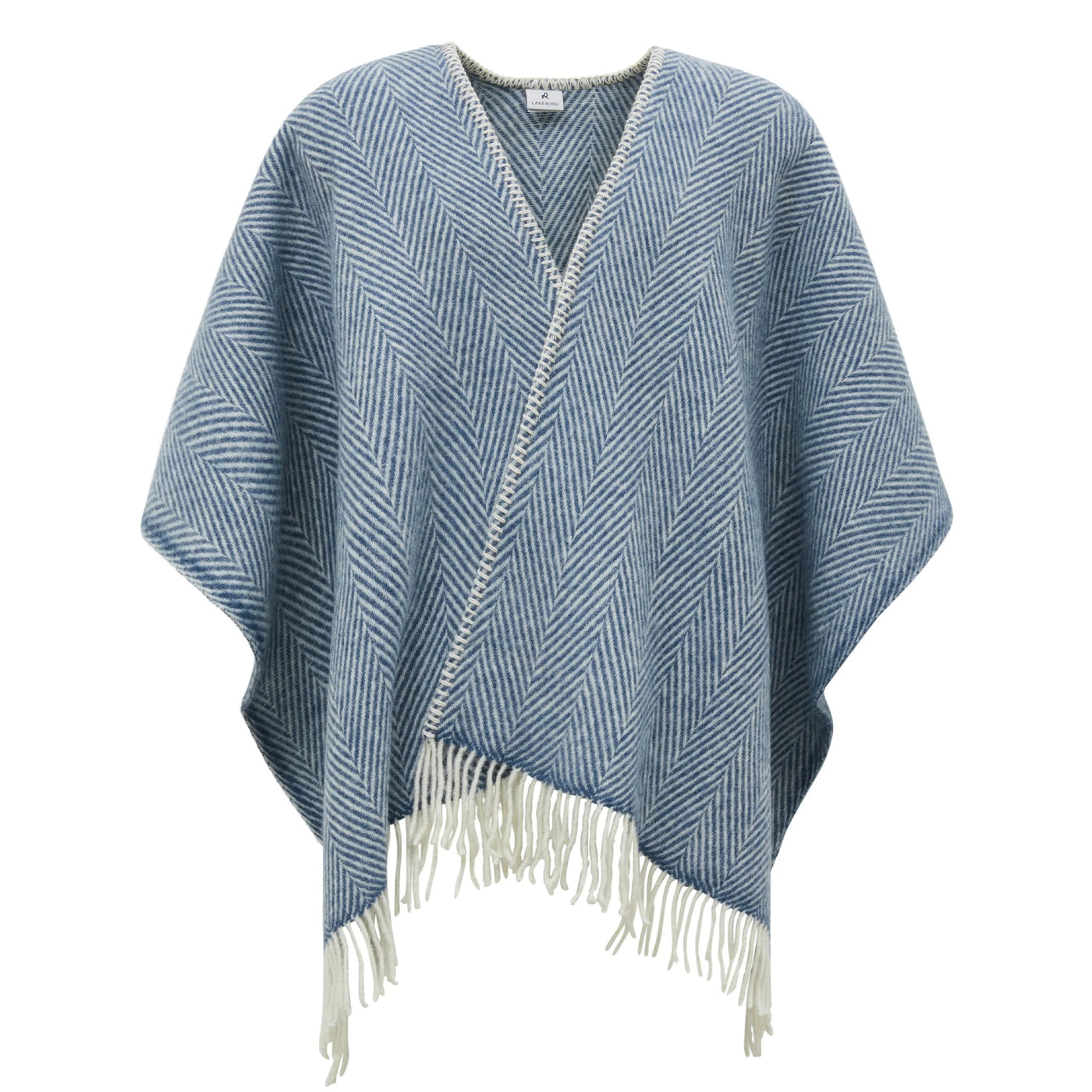 Lanerossi Iseo Spina poncho in denim blue herringbone weave with ivory fringe trim.