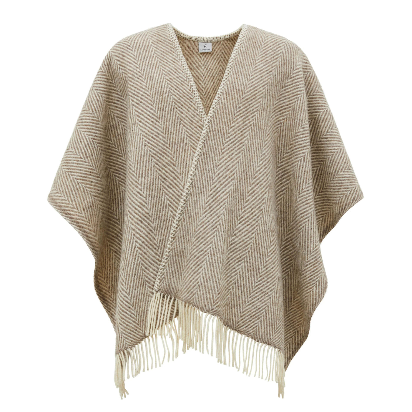 Herringbone-weave poncho in camel and ivory with fringe hem, front view.