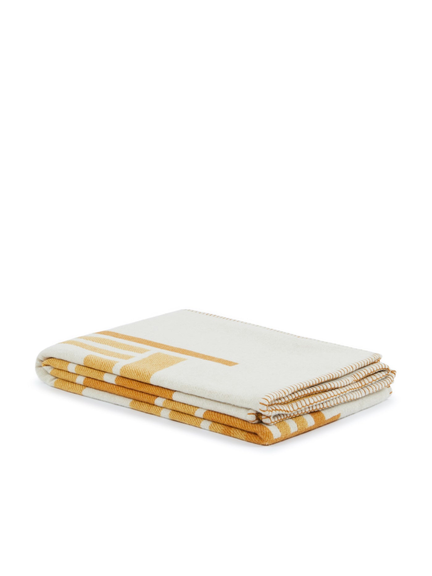 Lanerossi Metropolis throw folded, ivory with bold saffron geometric stripe pattern.