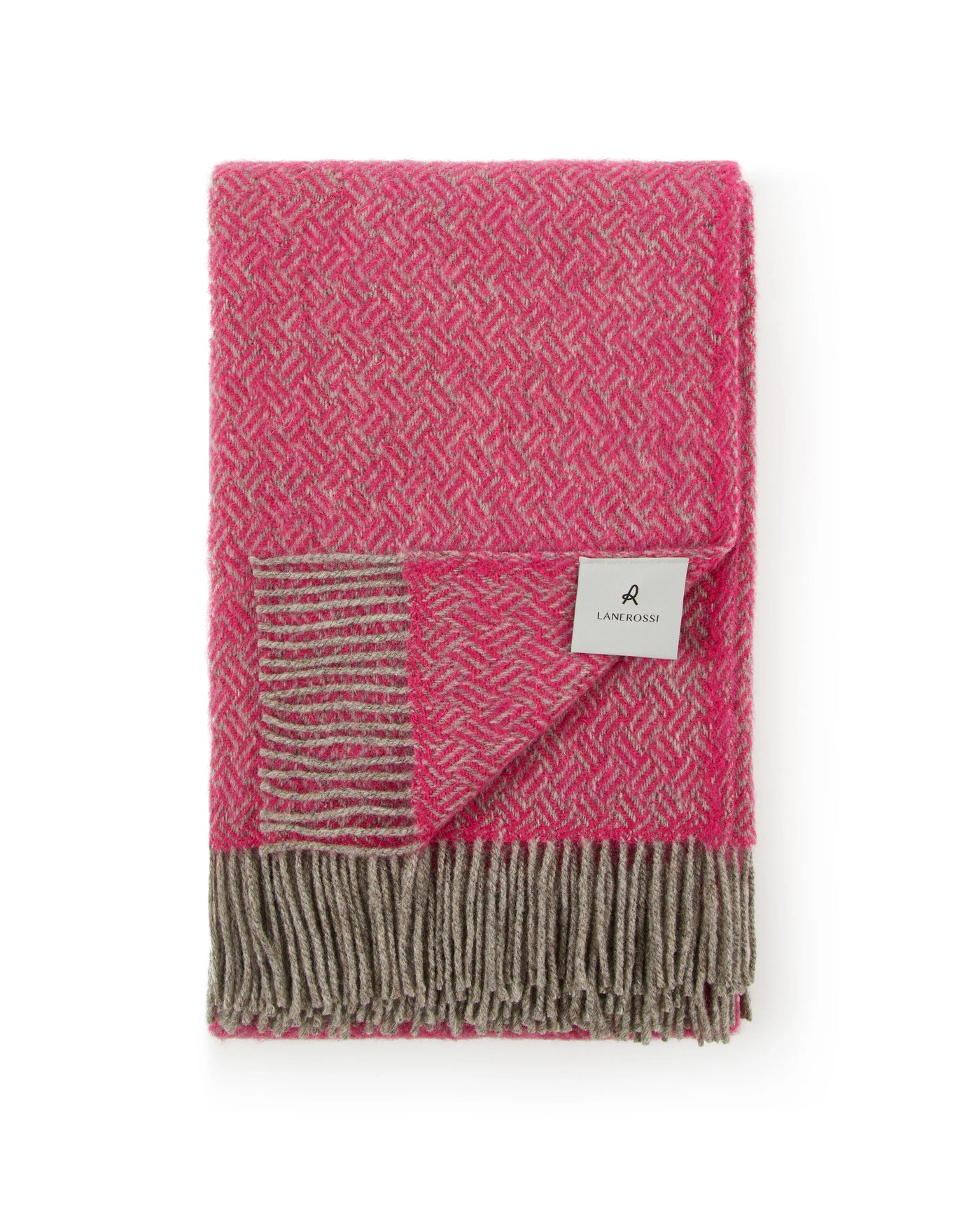 Lanerossi Mata Mata throw folded, raspberry and taupe herringbone weave with fringe hem.