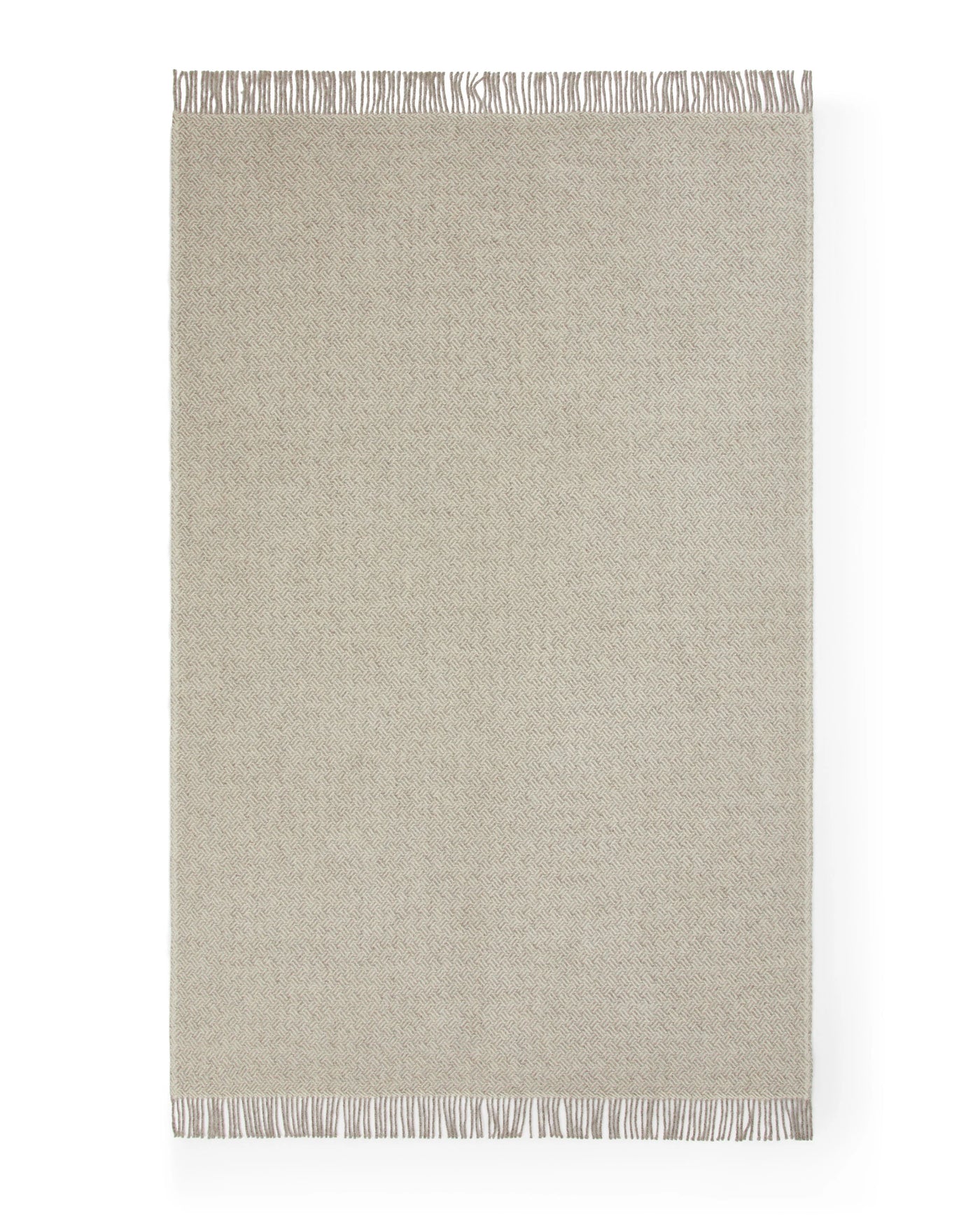 Lanerossi Mata Mata throw in ivory, flat lay showing fringe trim along top and bottom edges.