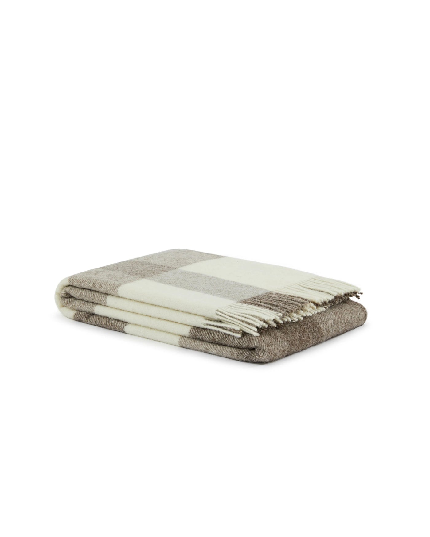 Folded Lanerossi Nelson throw in ivory and taupe plaid with fringe trim detail.