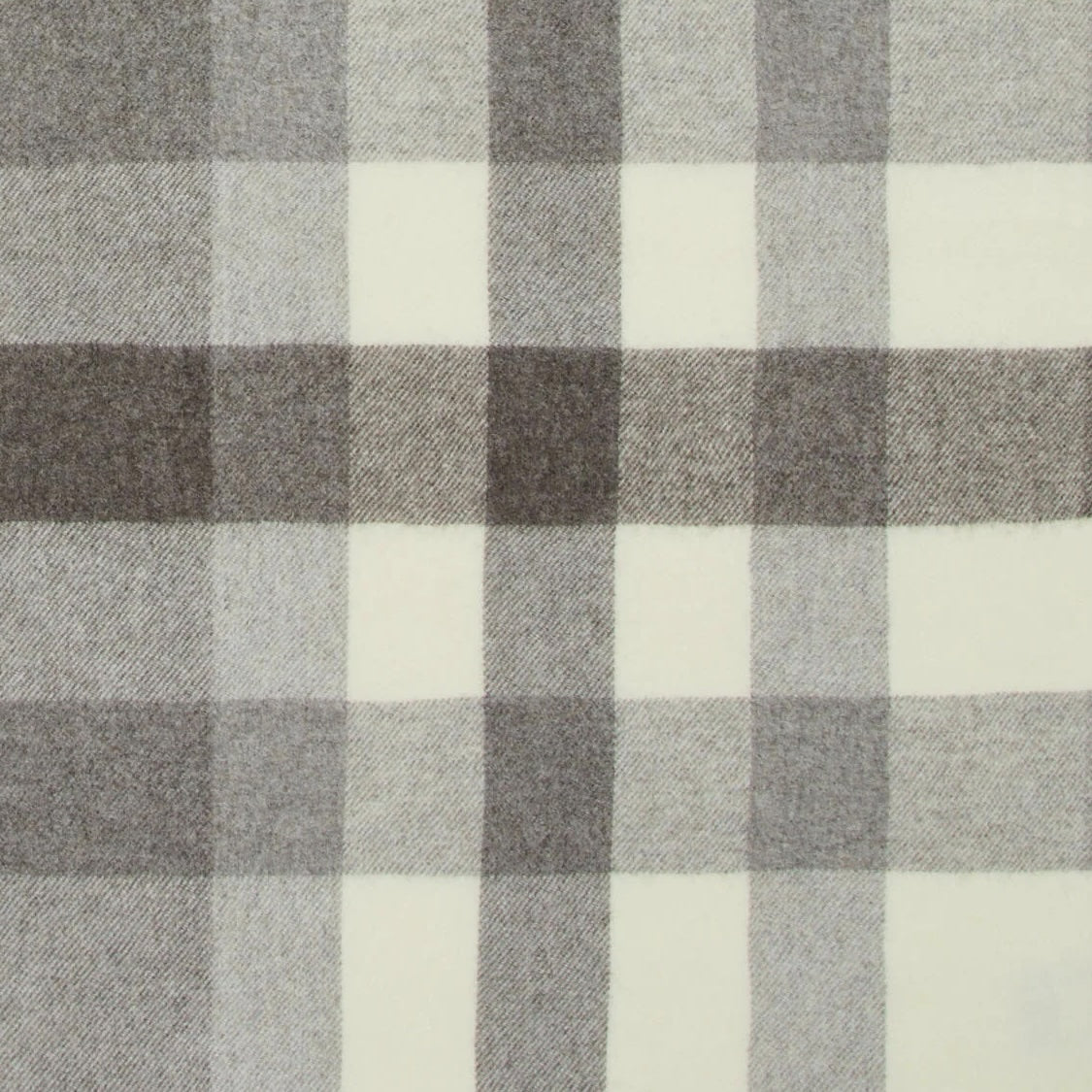 Close-up of Lanerossi Nelson throw's ivory and taupe plaid weave texture.