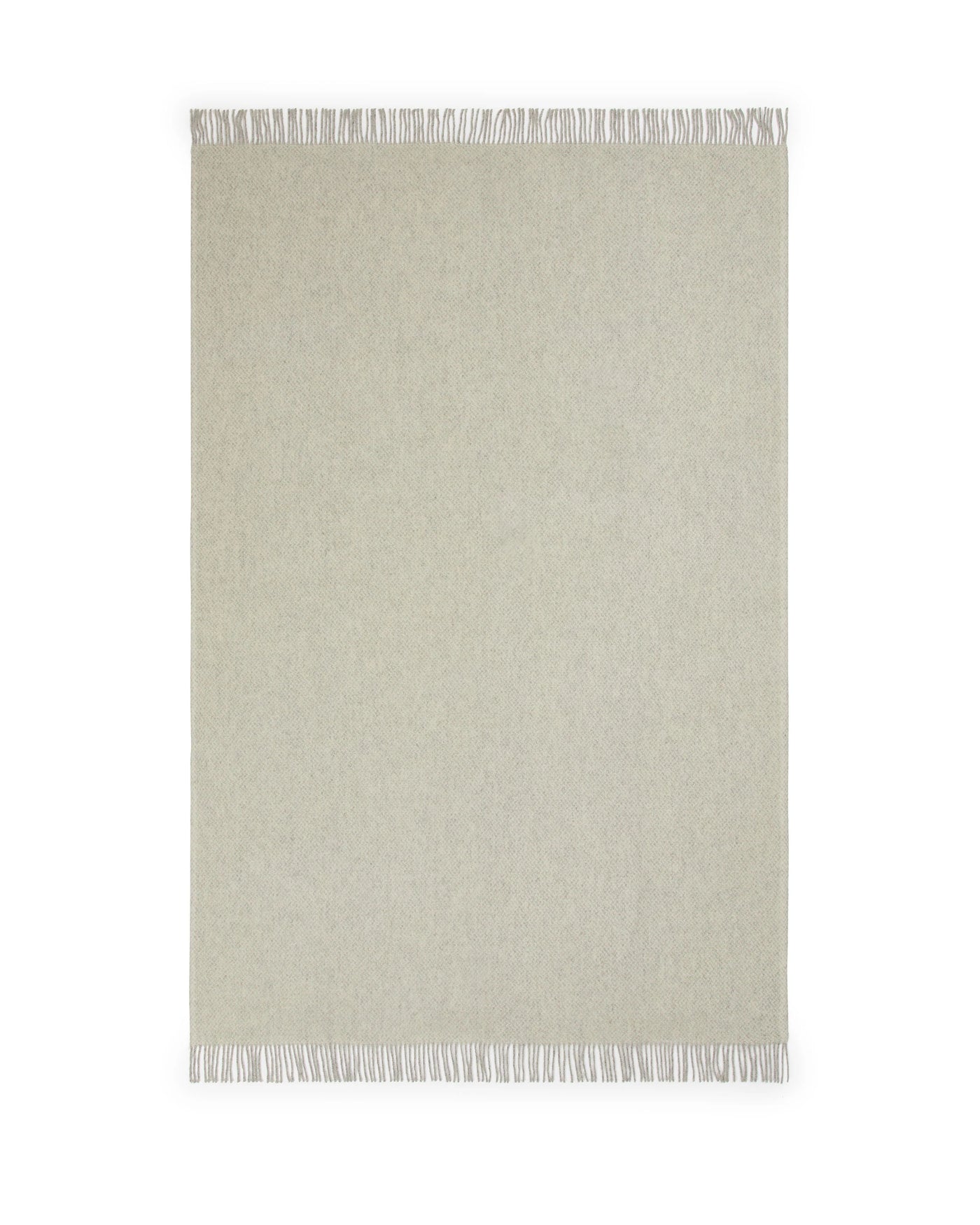 Lanerossi Northland throw in ivory, flat lay showing fringe trim detail.