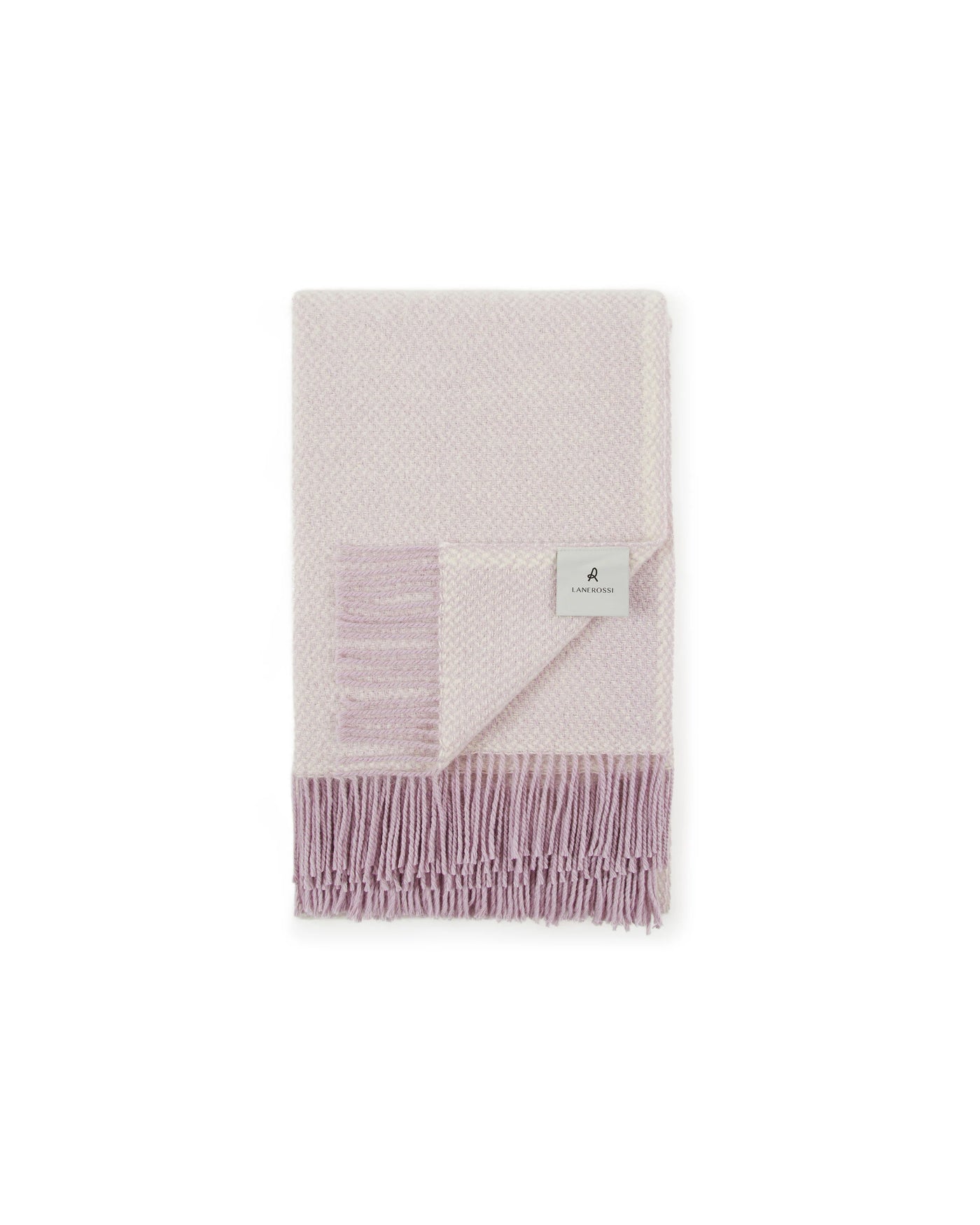 Lanerossi Northland throw folded flat, blush pink woven texture with fringe hem detail.
