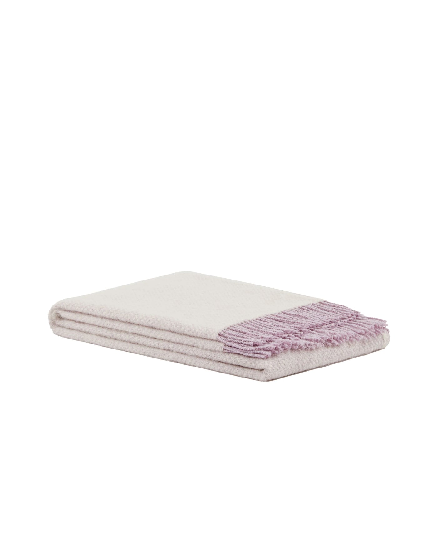 Lanerossi Northland throw folded, ivory with lilac fringe detail.