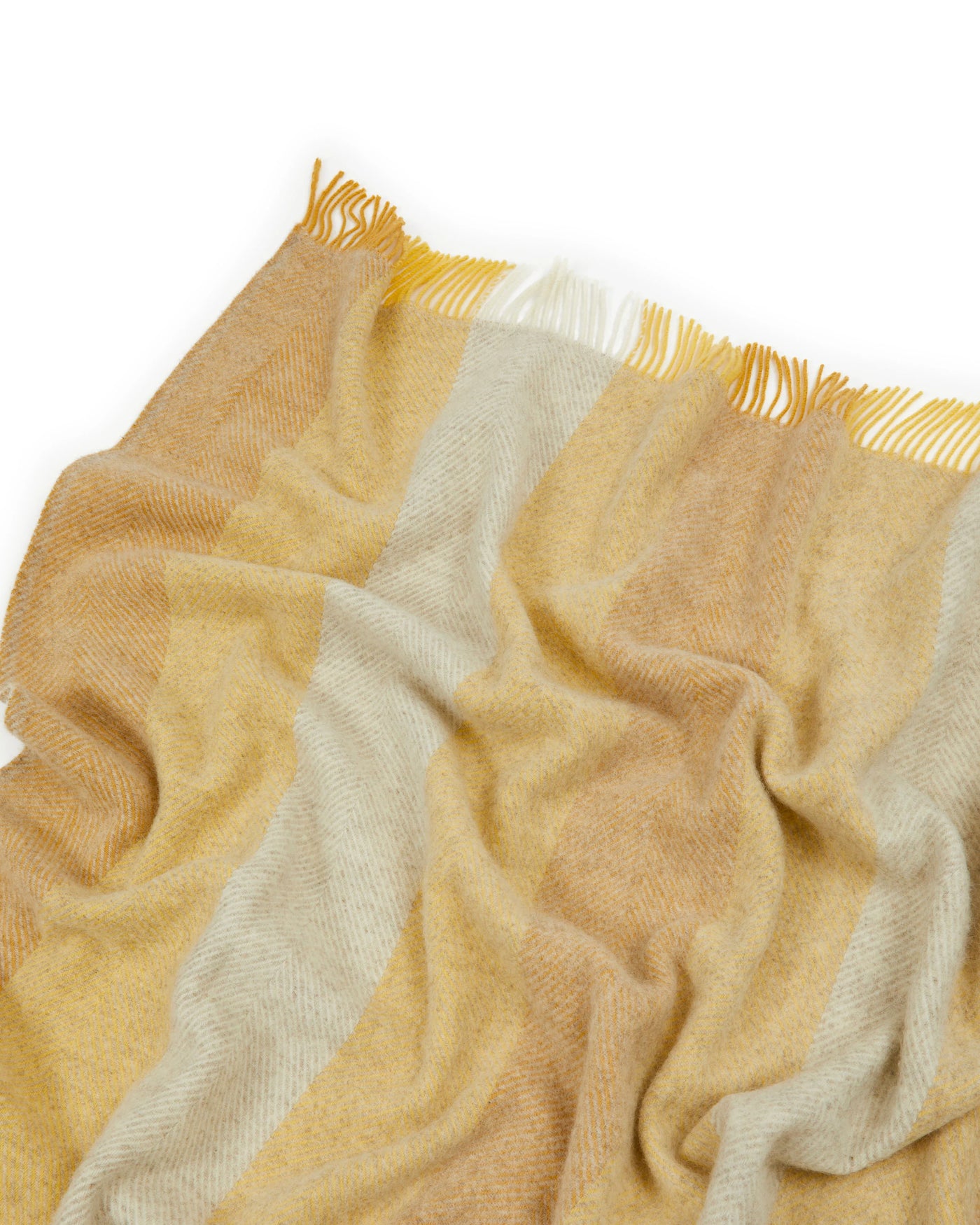 Close-up of Lanerossi Opua throw's fringed edge, camel and ivory wide stripes with gold fringe.