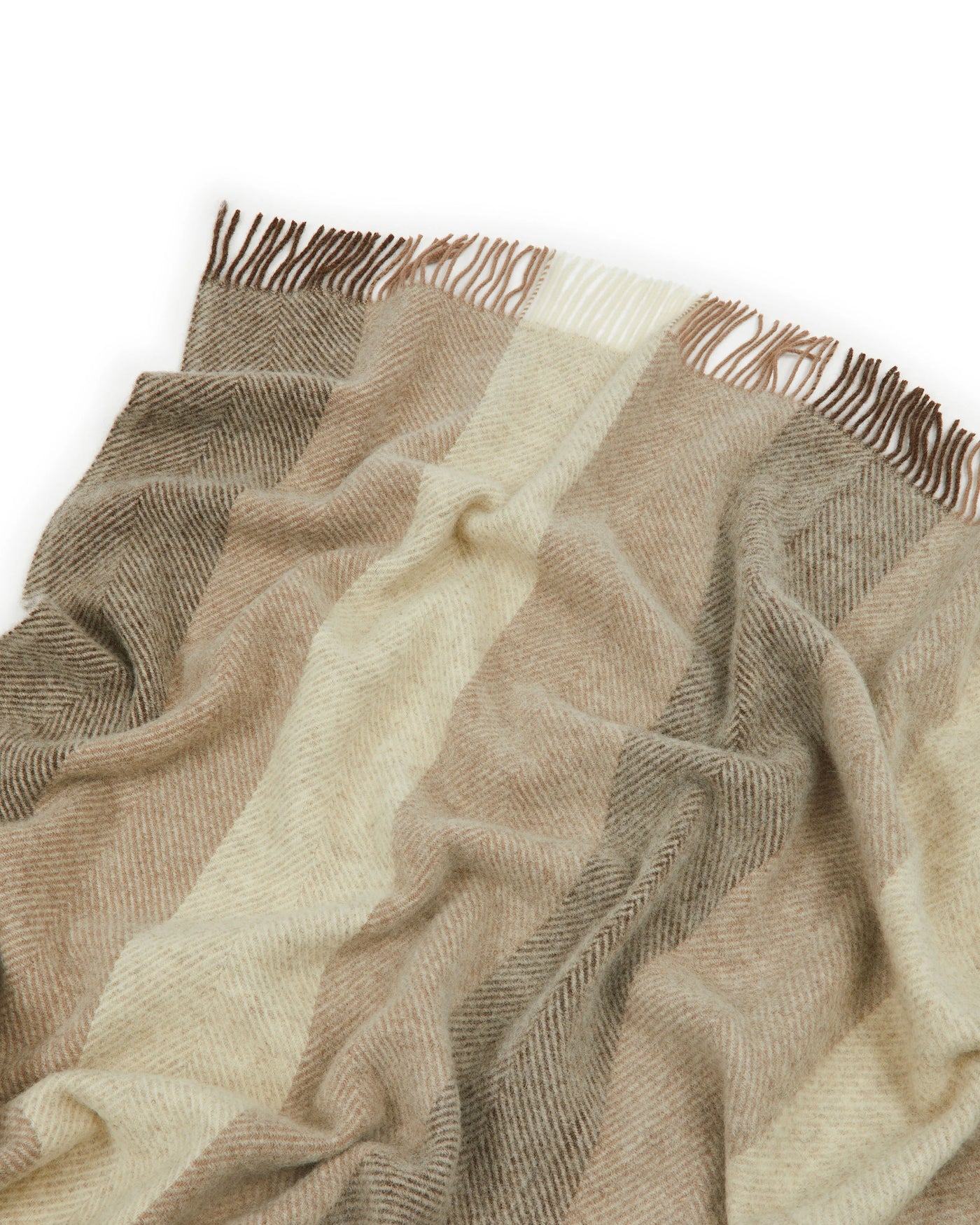 Lanerossi Opua throw in taupe and ivory herringbone weave with fringed edges.
