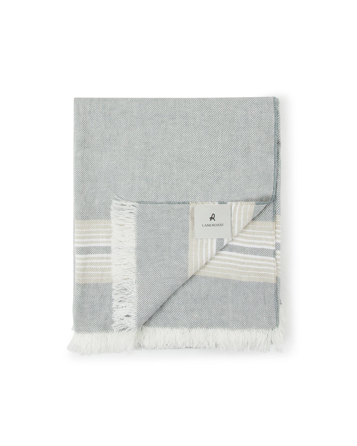 Lanerossi Palau throw folded flat, showing ivory fringe edge and stripe border detail.