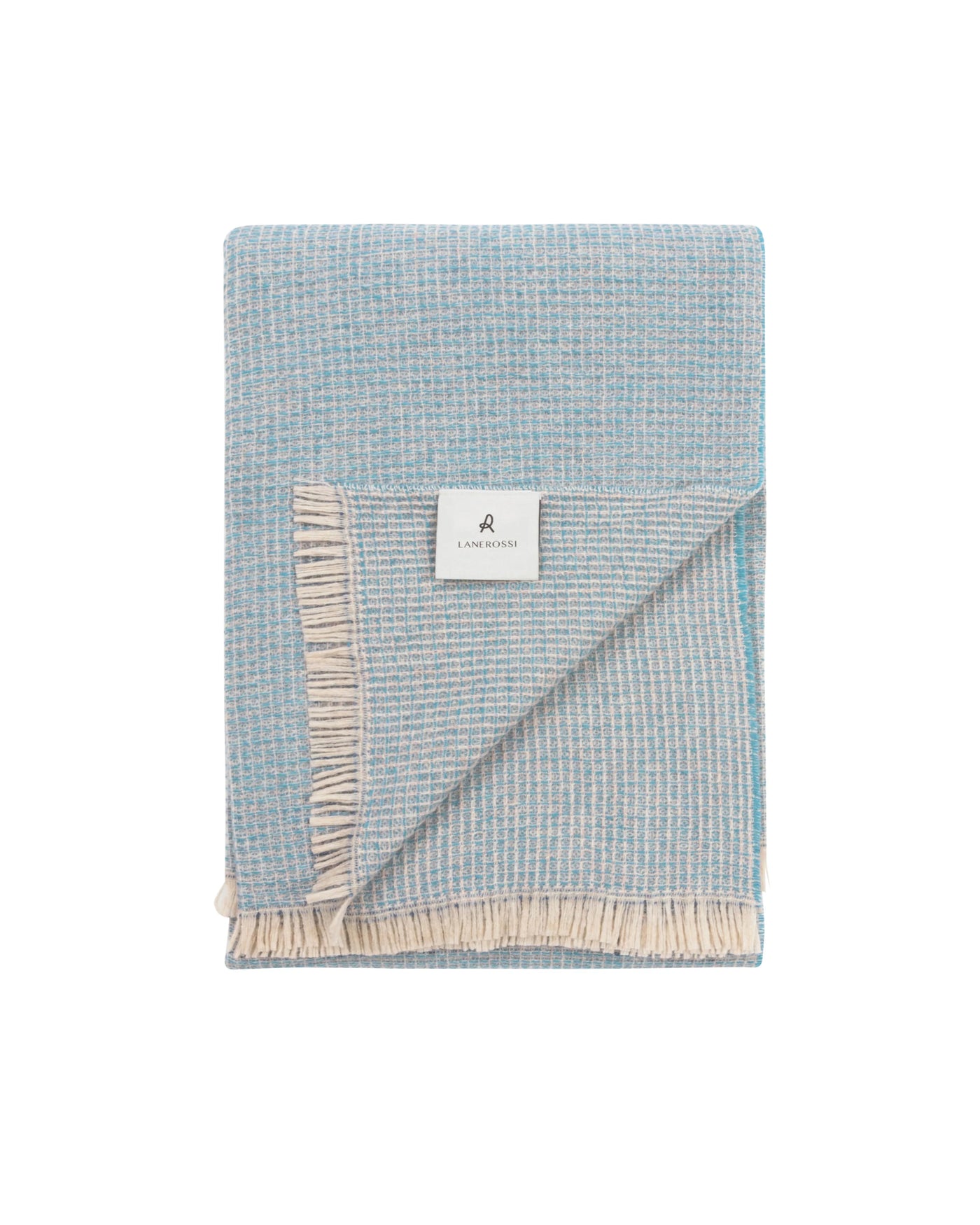 Lanerossi Rossi Moon throw folded, showing sky blue woven texture and cream fringe trim.
