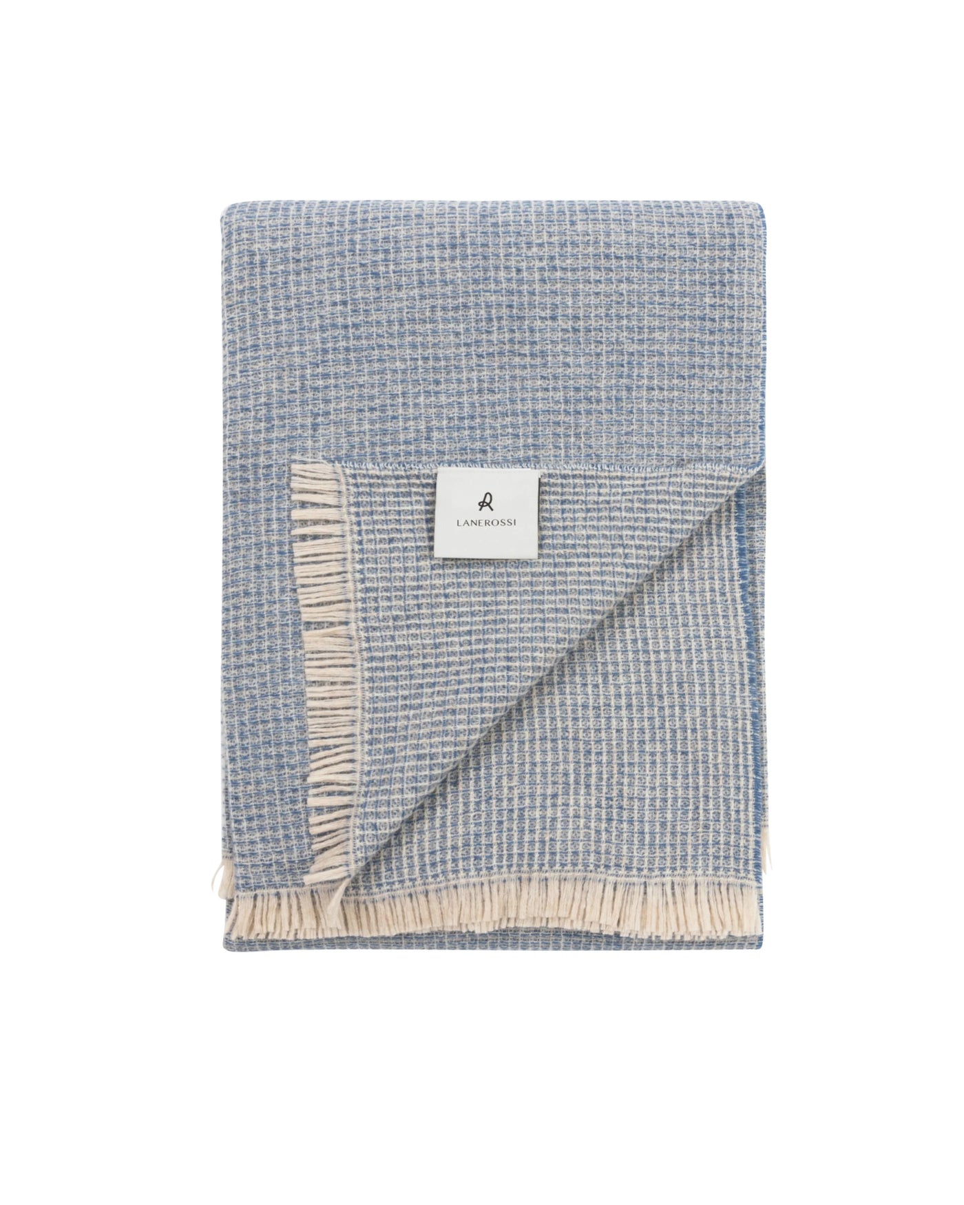 Lanerossi Rossi Moon throw folded, blue and ivory waffle weave with fringe trim.