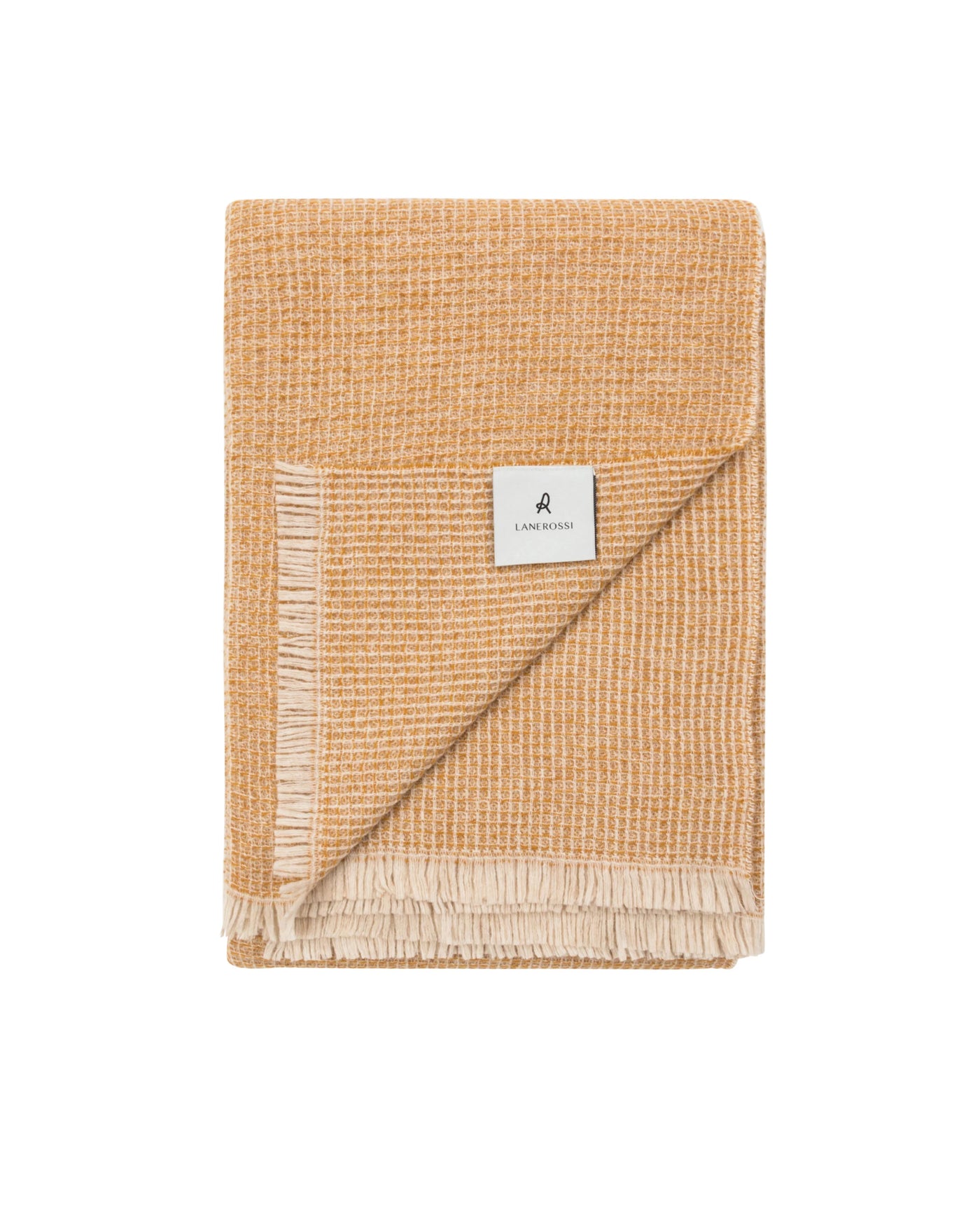 Lanerossi Rossi Moon throw folded to reveal ochre and ivory woven texture with fringe hem.