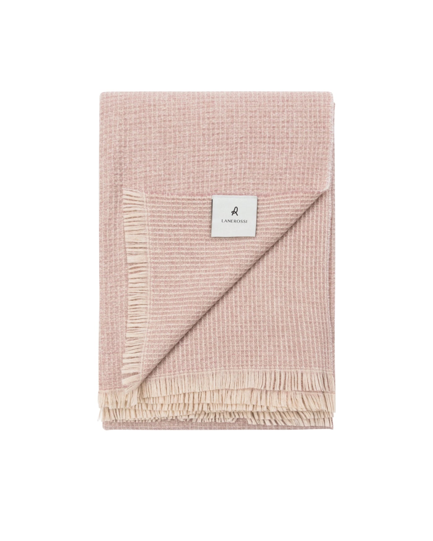 Lanerossi Rossi Moon throw folded flat, blush waffle-knit wool with ivory fringe trim.