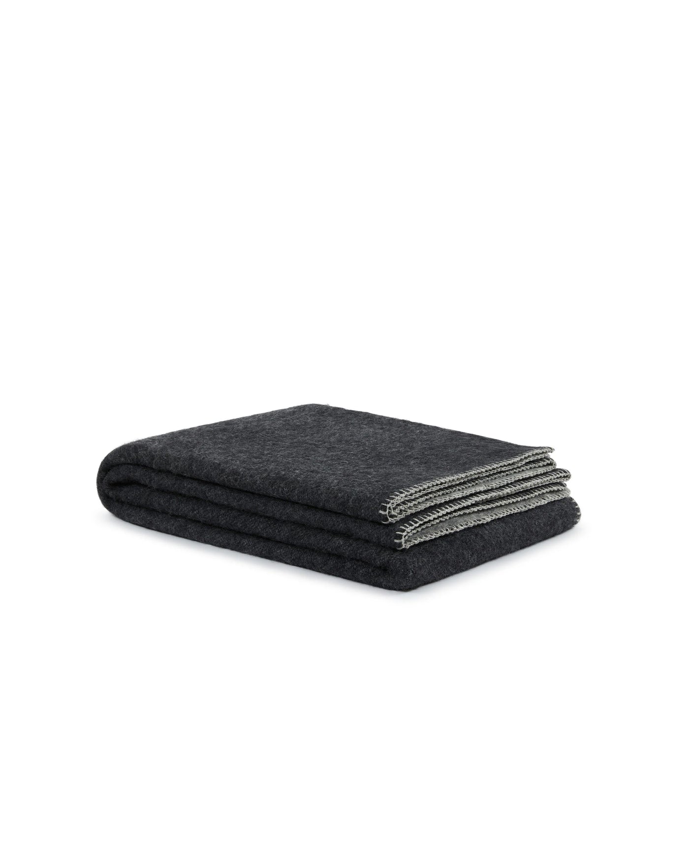 Lanerossi Southland throw folded, charcoal wool with contrast grey edge trim.