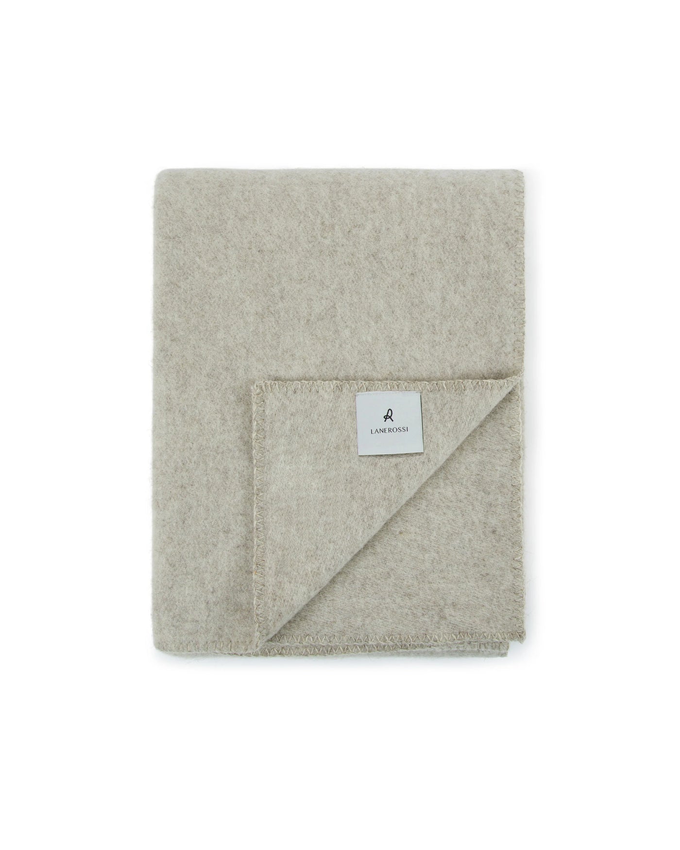 Lanerossi Southland throw folded flat, oatmeal wool with branded label detail.