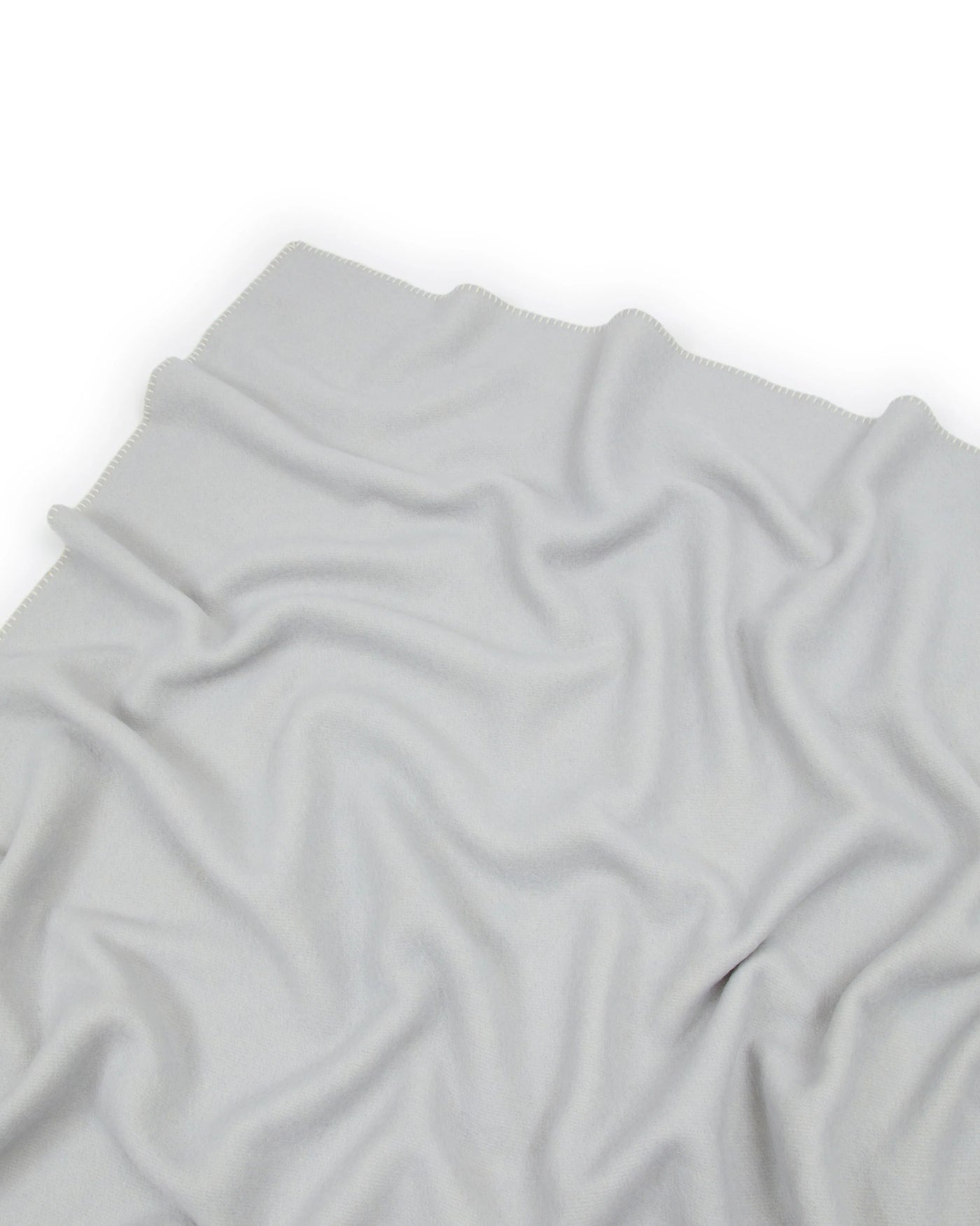 Lanerossi Southland throw in silver-grey, draped flat showing smooth fabric surface.