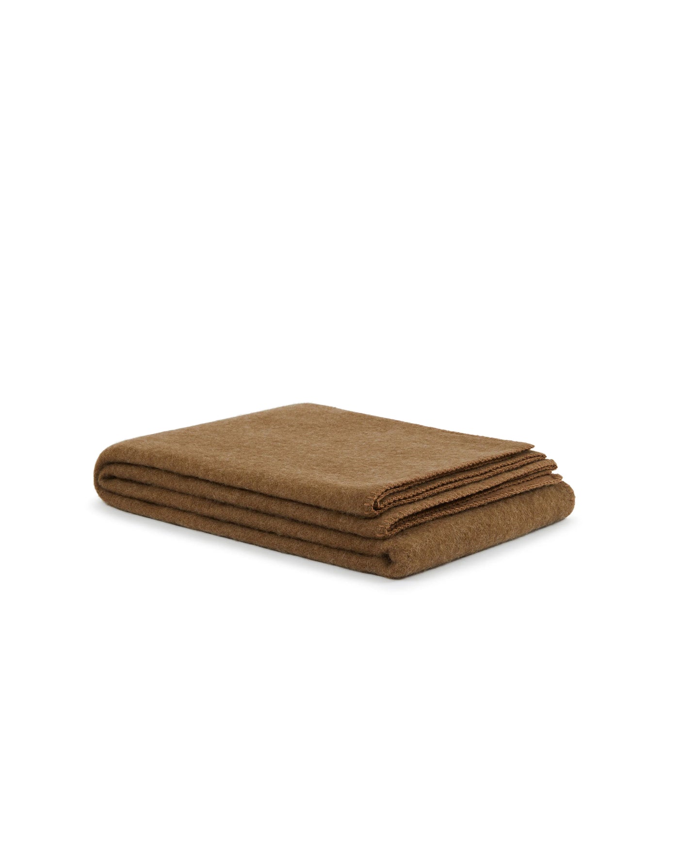 Lanerossi Southland throw folded flat, showing camel wool texture and neat hemmed edges.