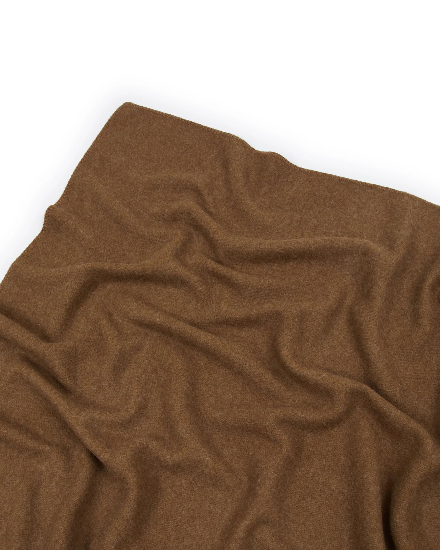 Lanerossi Southland throw in camel, close-up showing soft boiled wool texture and natural drape.