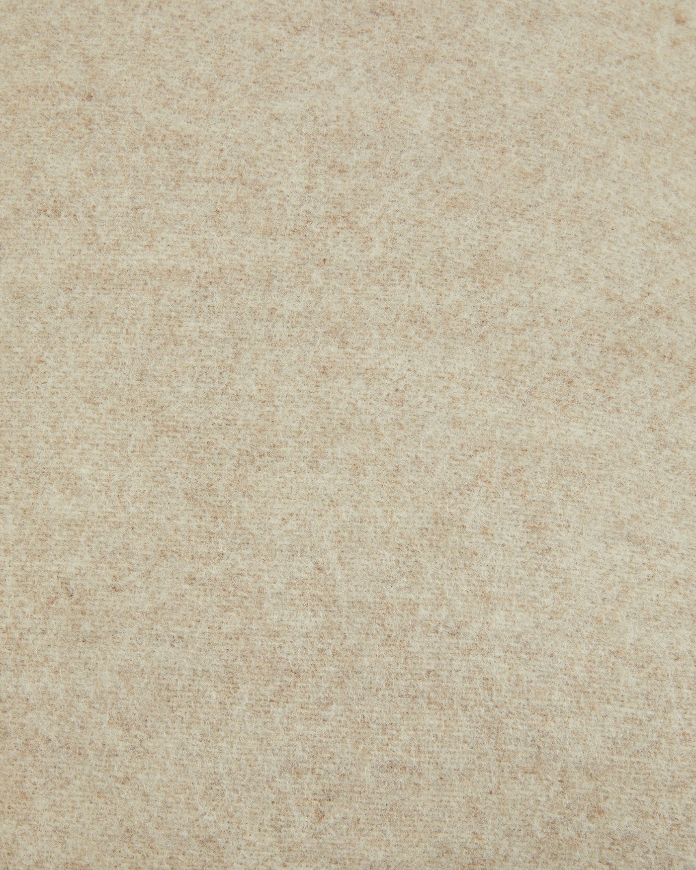 Close-up of Lanerossi Southland cushion fabric in natural, showing soft wool-blend weave texture.