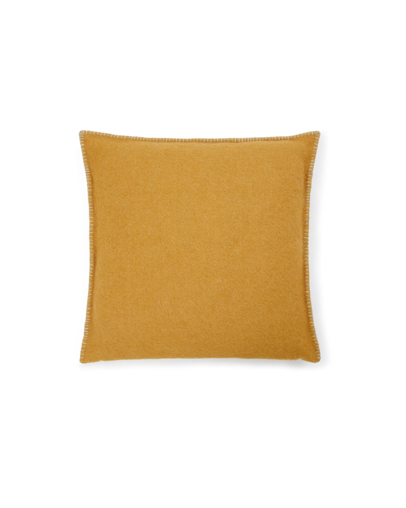 Mustard yellow wool cushion with contrast whipstitch trim detail along edges.