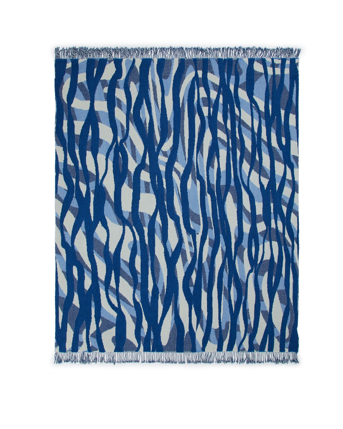 Lanerossi Struttura throw, indigo and sky blue wave pattern with fringe trim.