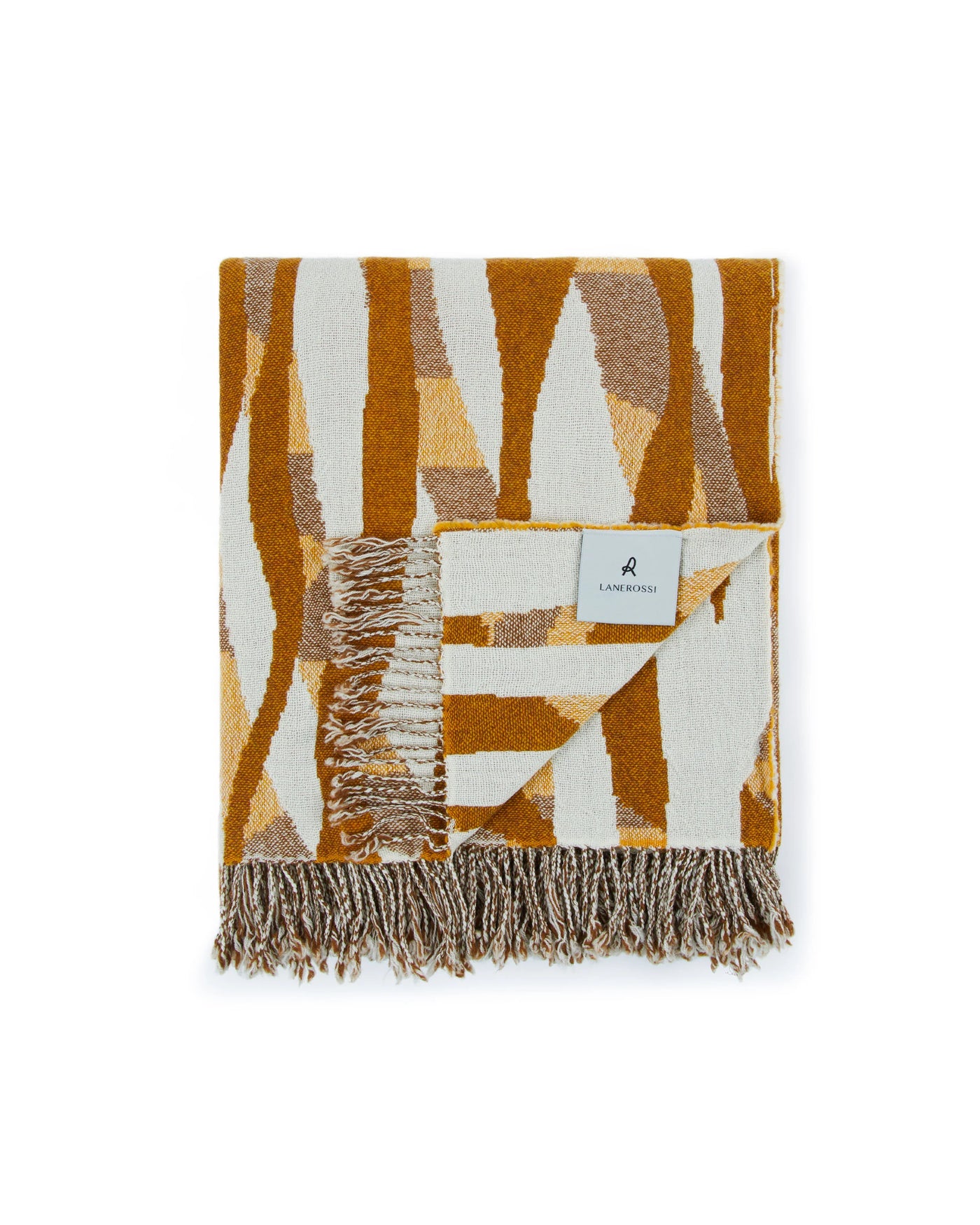 Lanerossi Struttura throw in amber and ivory abstract pattern with fringe trim, folded flat.