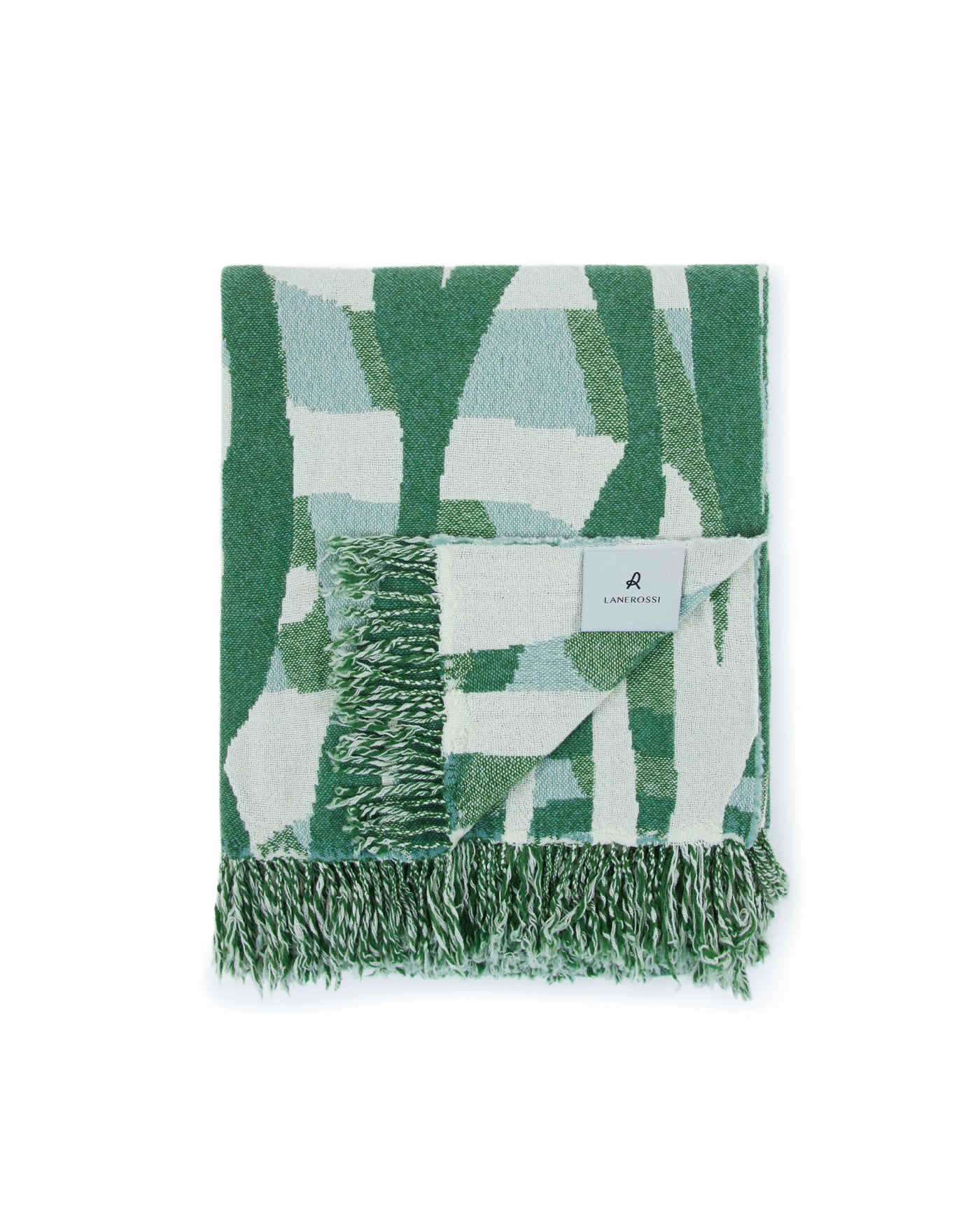 Lanerossi Struttura throw folded, green abstract brushstroke pattern with fringe trim.
