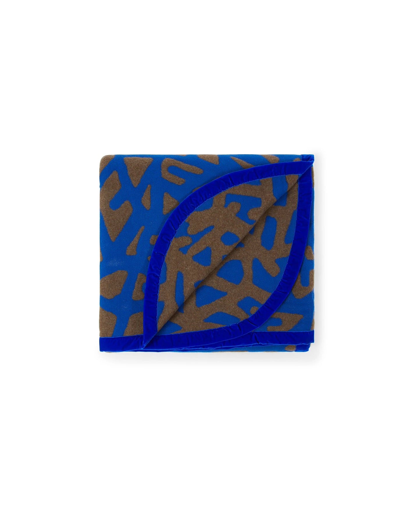 Lanerossi Tribal blanket folded, cobalt blue and taupe animal print with solid blue trim.