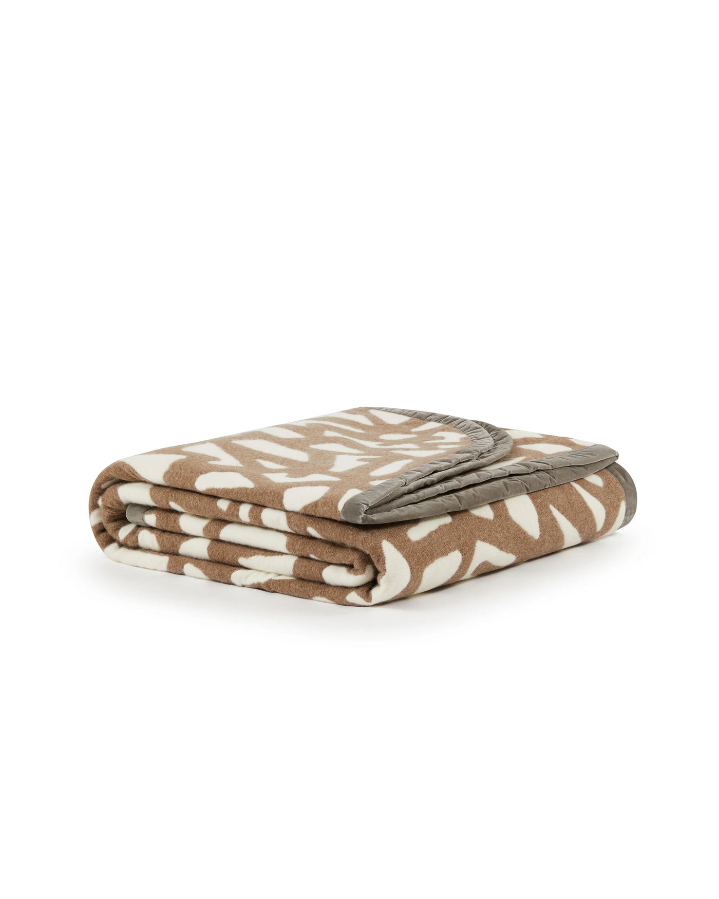Lanerossi Tribal blanket folded, showing camel and ivory abstract leaf pattern with grey reverse.