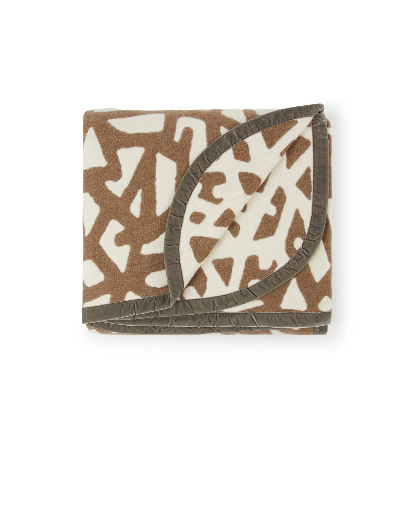 Lanerossi Tribal blanket folded, camel abstract print on ivory with taupe satin trim.