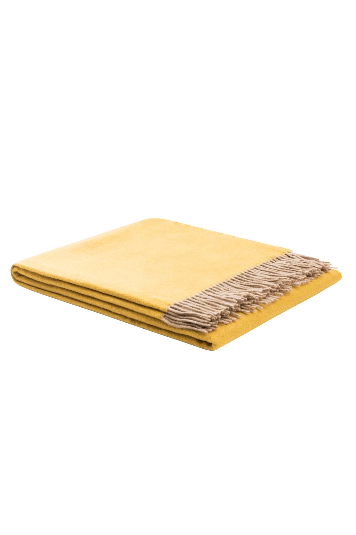 Folded saffron wool throw with natural taupe fringe trim, angled product view.