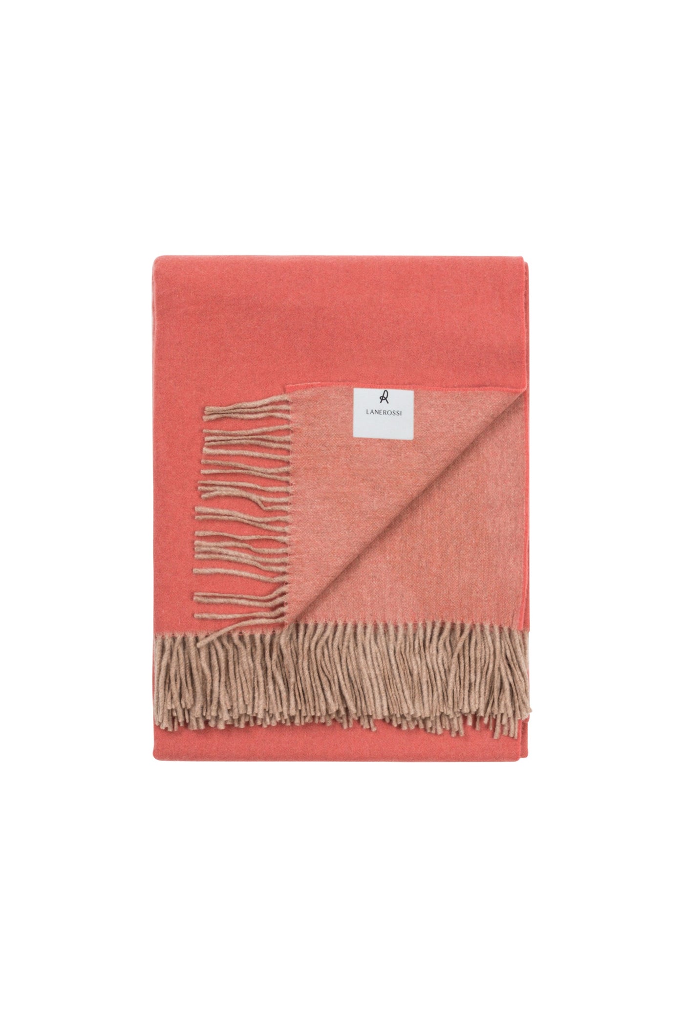 Folded coral and taupe reversible wool throw with fringe trim, Lanerossi label visible.