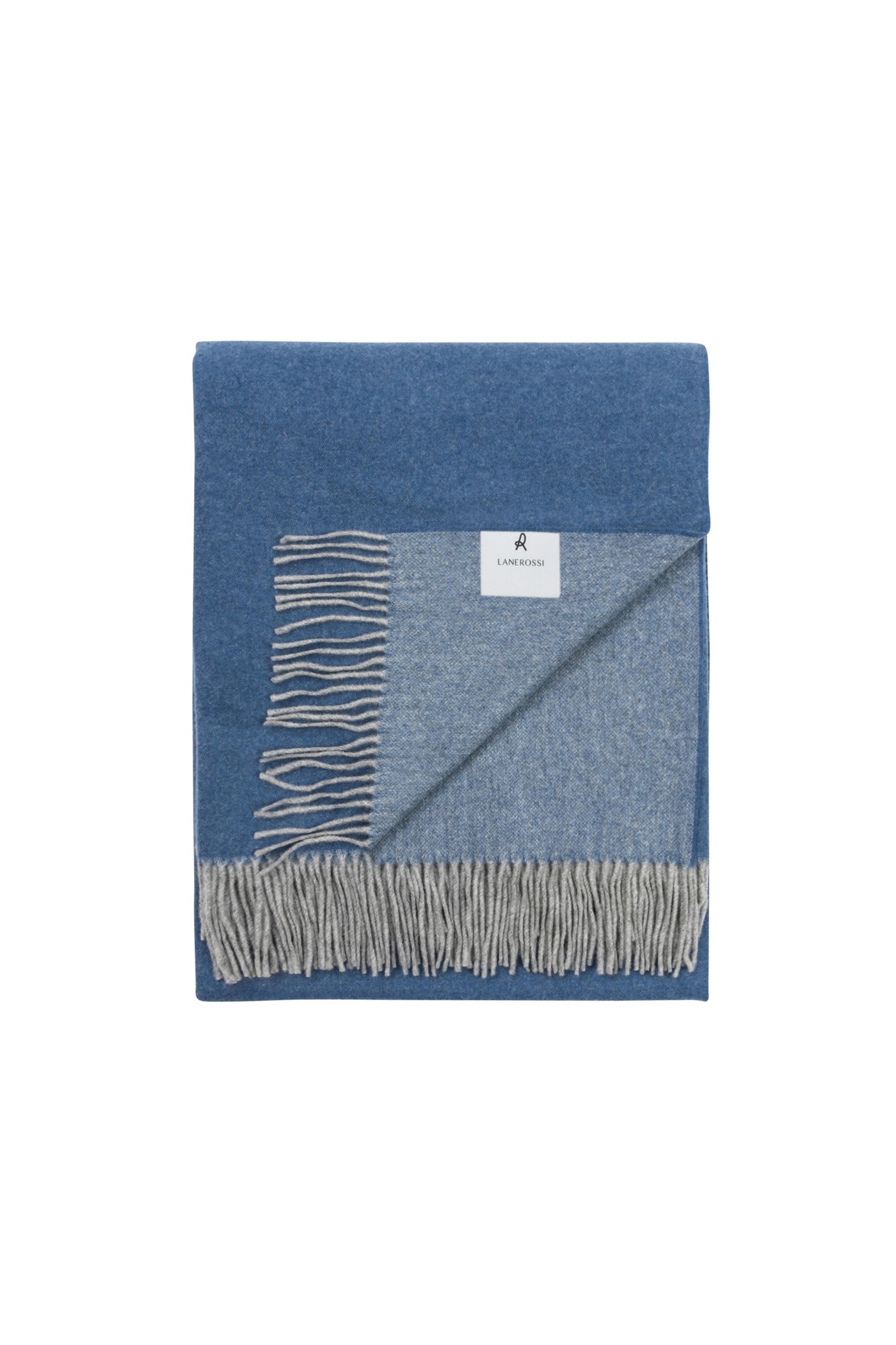 Reversible denim blue and grey wool throw, folded to show fringe trim and both colorways.