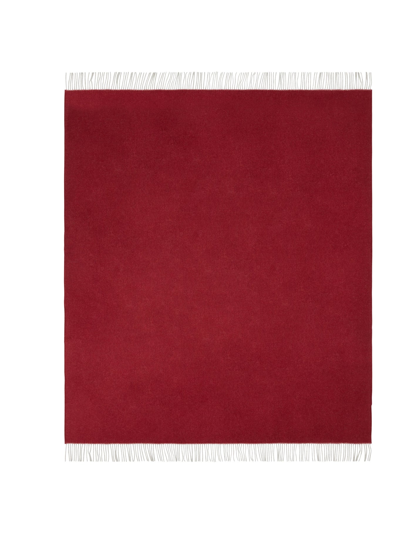 Crimson wool throw laid flat, showing ivory fringe trim along the bottom edge.