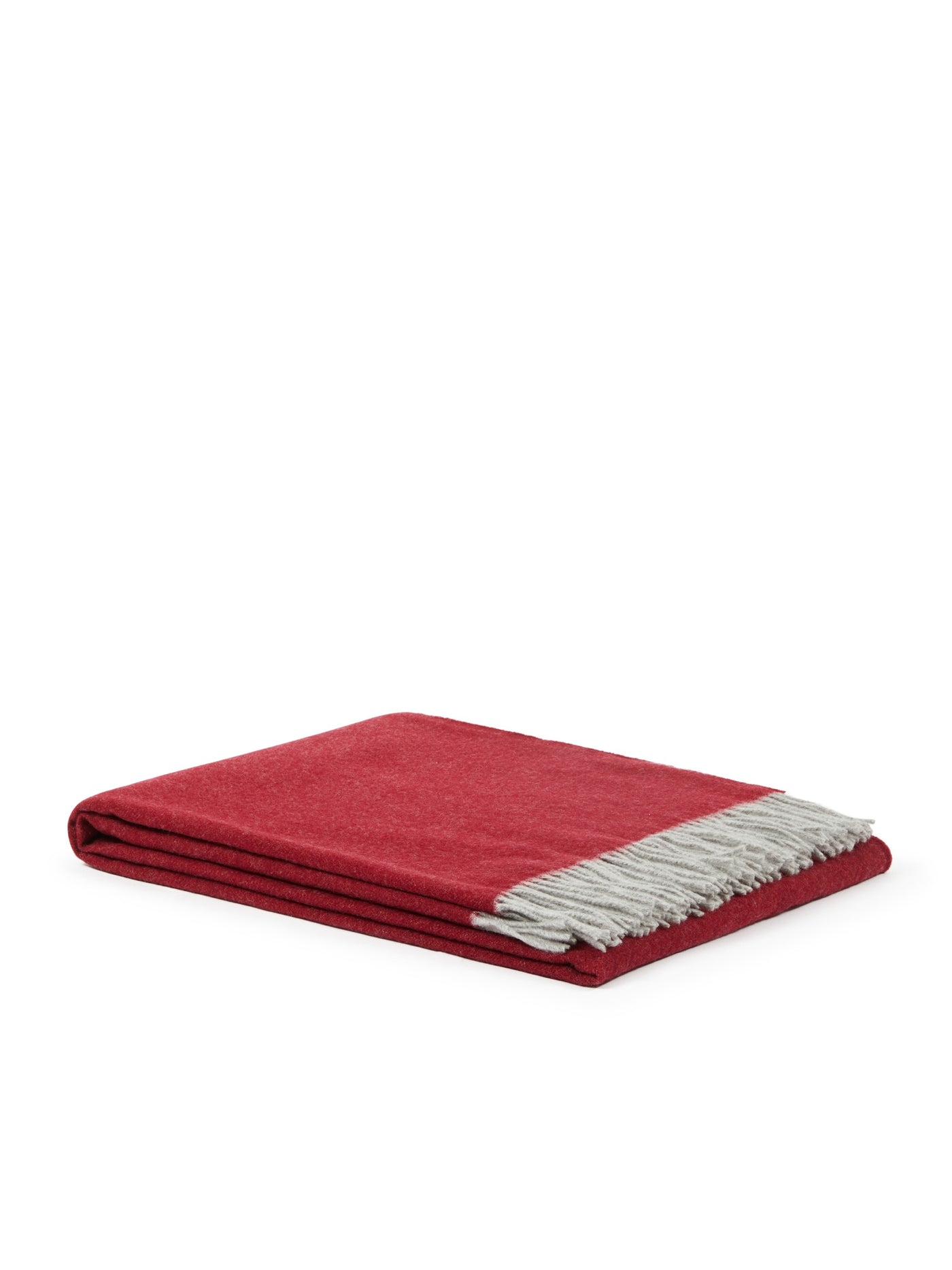 Lanerossi Ulisse throw folded in crimson with contrast silver fringe detail.