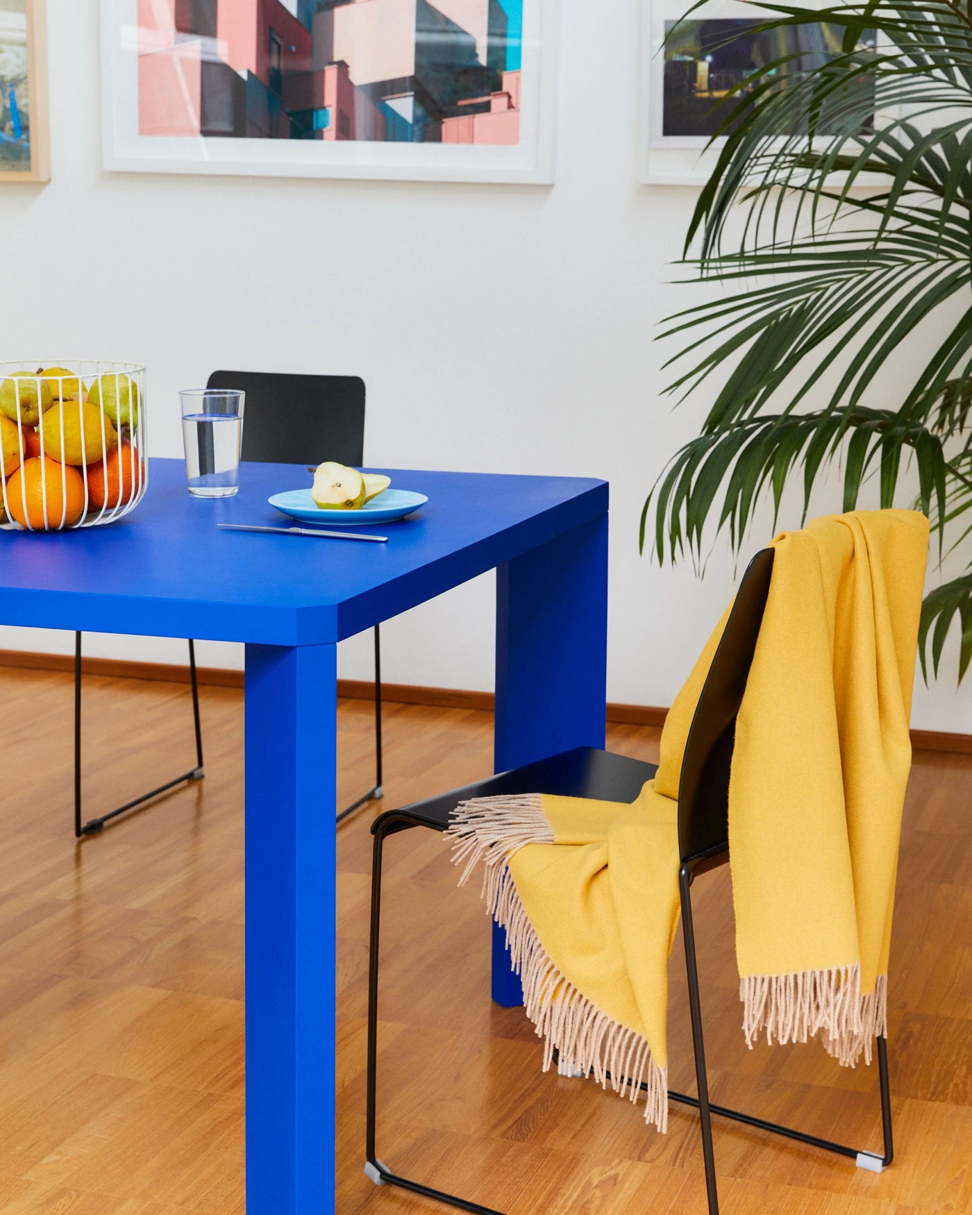 Lanerossi Ulisse throw in golden yellow with fringe trim, draped over a chair.